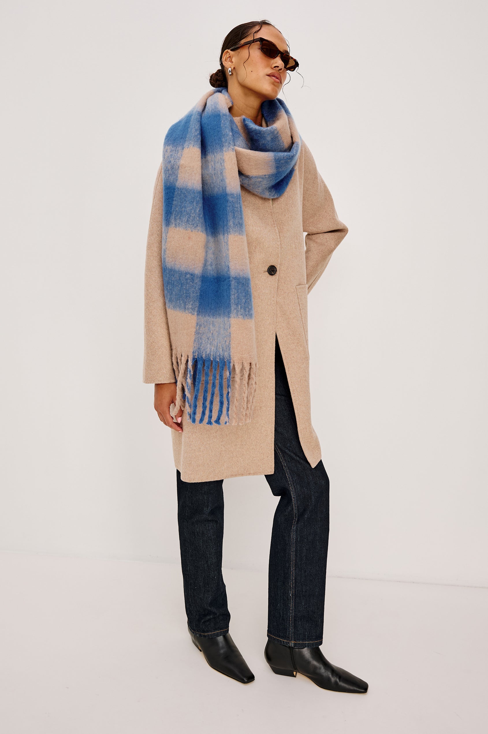 Oslo Scarf with Twisted Tassels and a Checkered Pattern in Cobalt Camel Colorway - Front Full Body View Featured on Model
