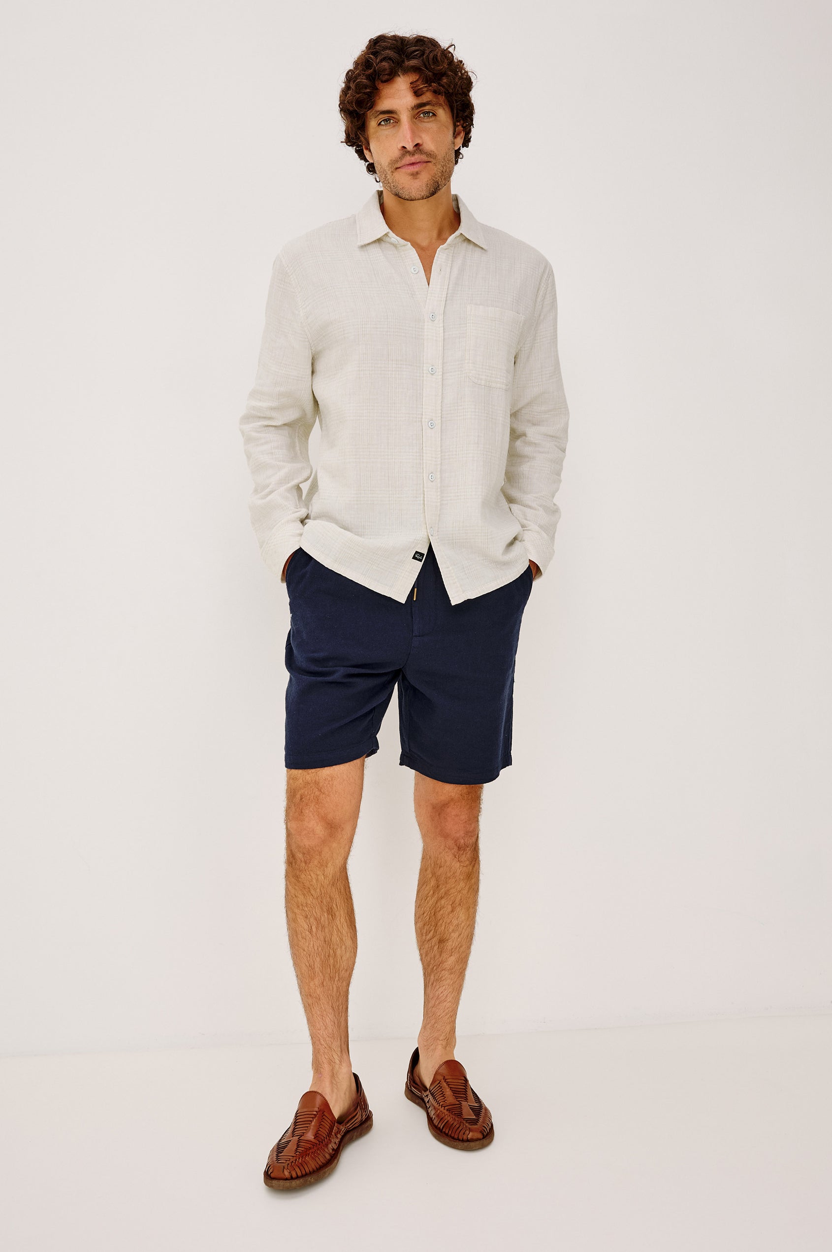 Owens Shirt in Lightweight Cotton With Front Buttons, Subtle Texture, Collar, Long Sleeves, and Chest Patch Pocket in Desert Path Colorway - Full Body Front View Featured on Model