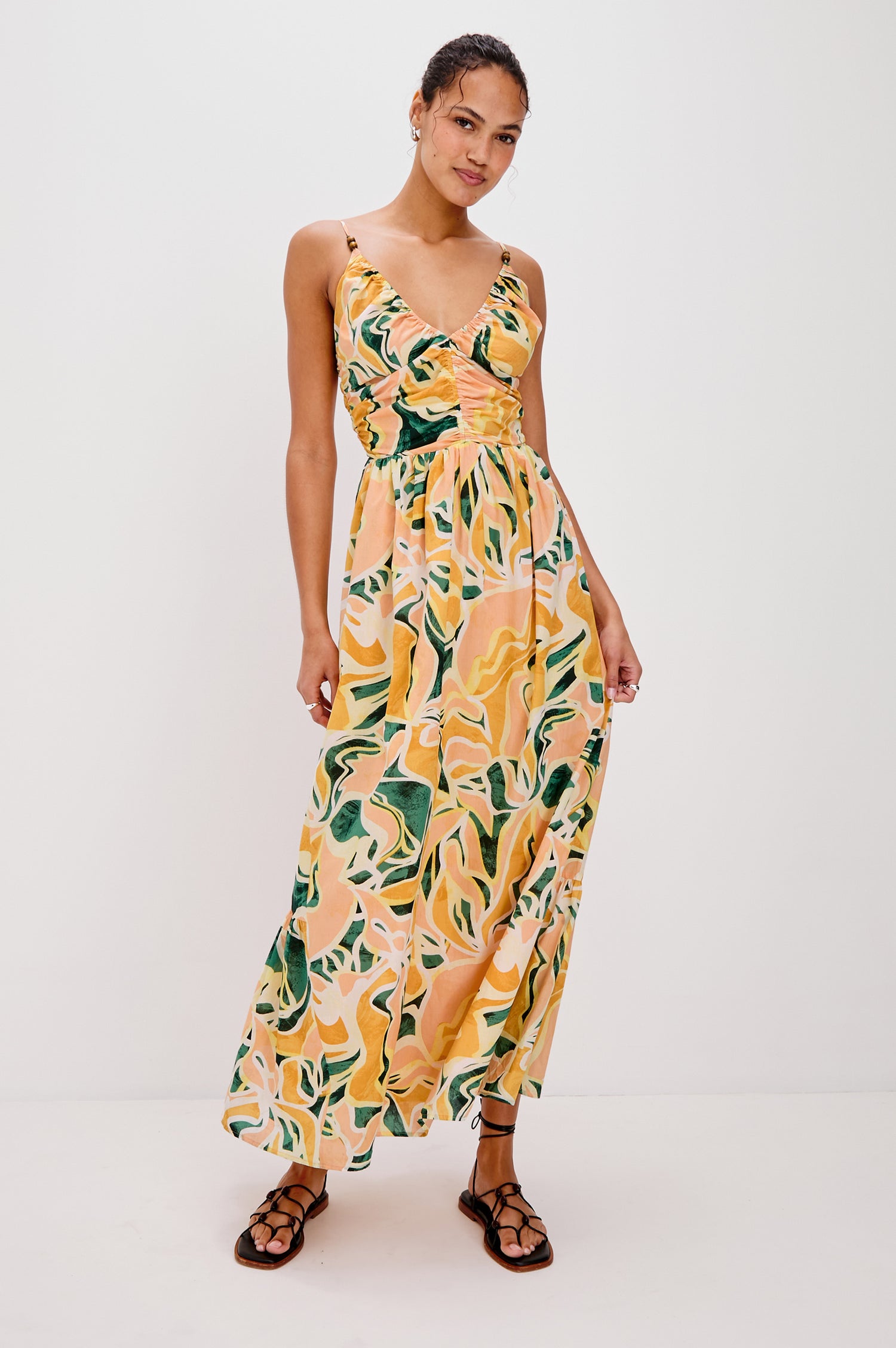 Palm V-Neck Midi Dress with Spaghetti Straps and Gathering Details on Bodice in Tulum Colorway. Full Body Front View Shown on Model.