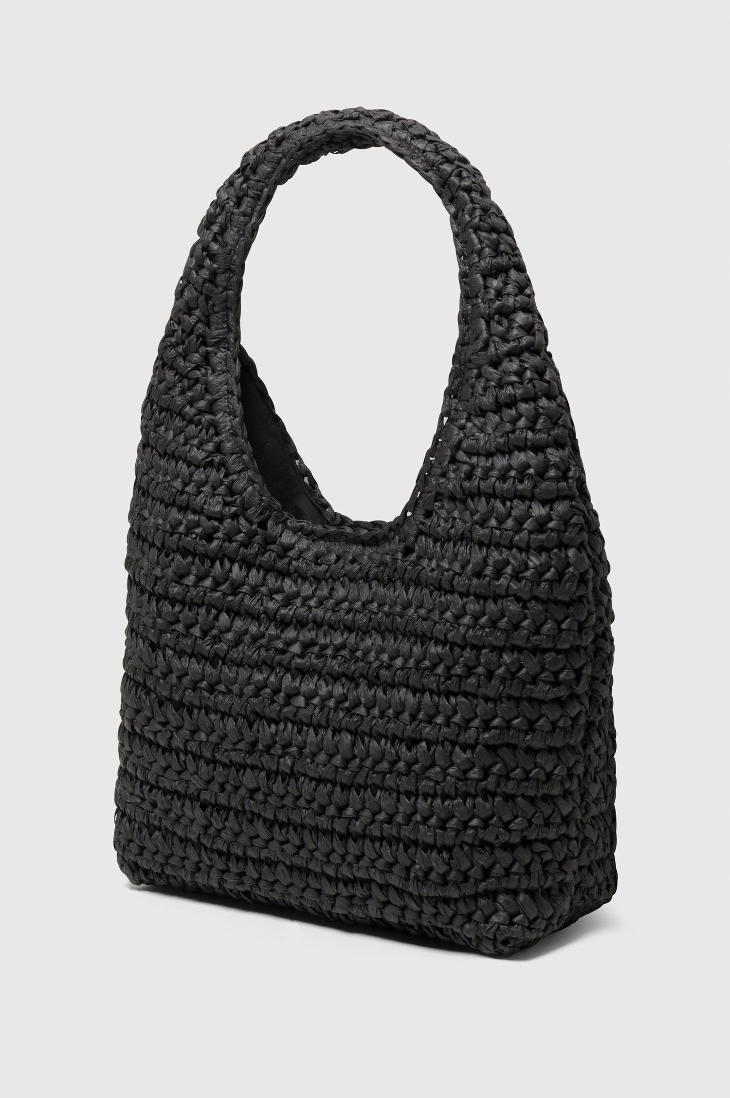 Palma rattan woven shoulder bag in Black - side view