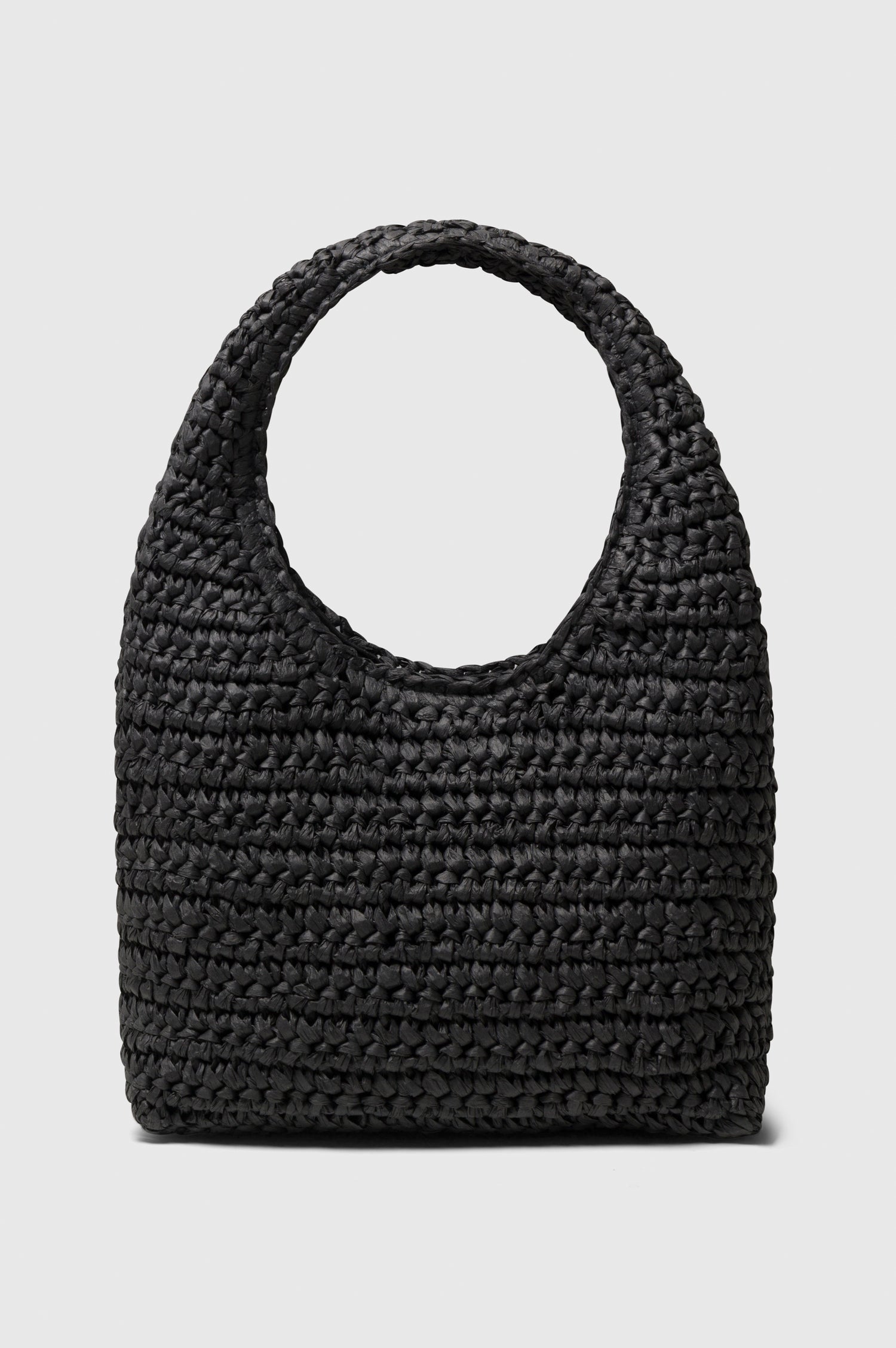 Palma rattan woven shoulder bag in Black - front view