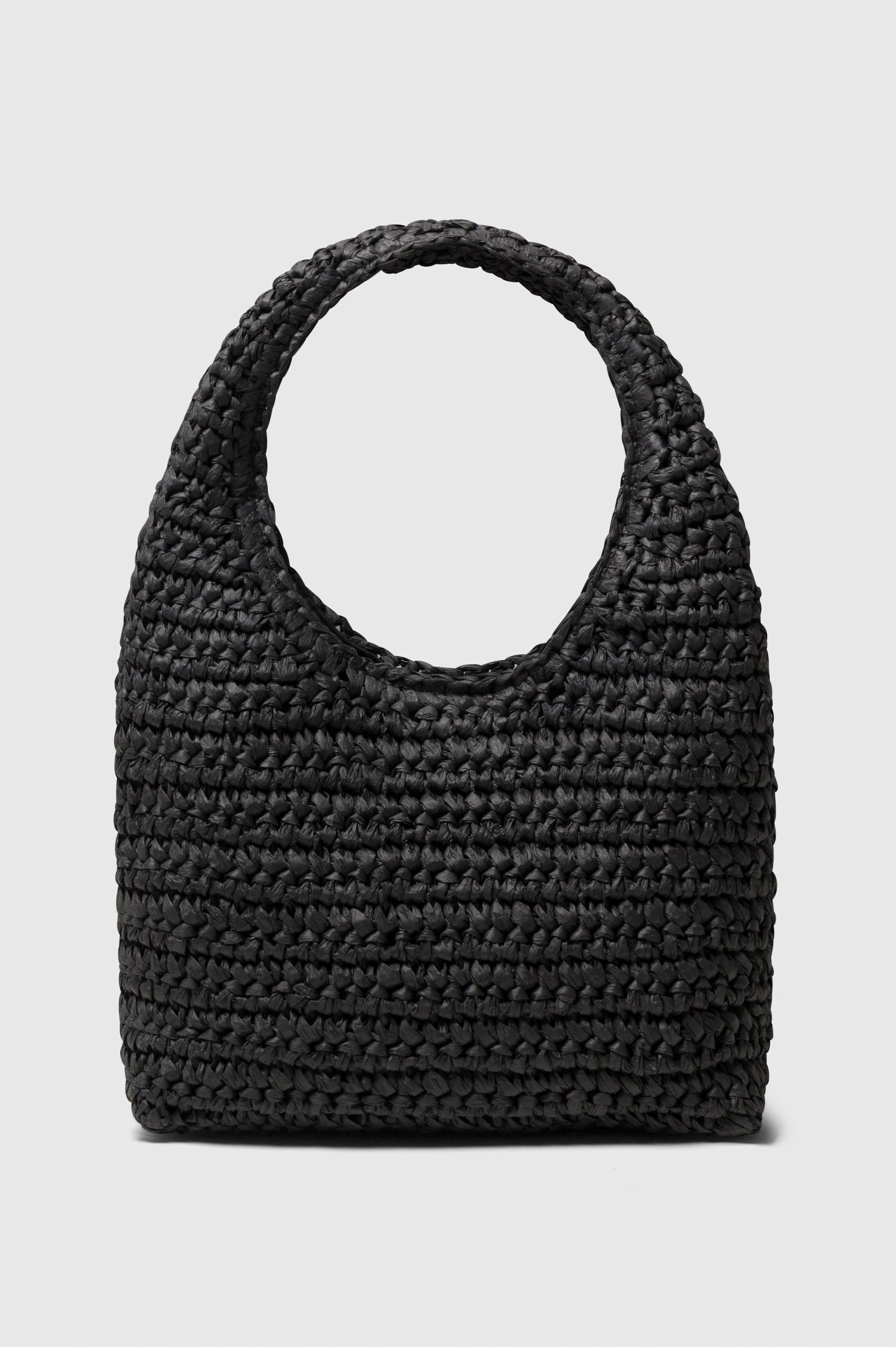 Palma rattan woven shoulder bag in Black - front view