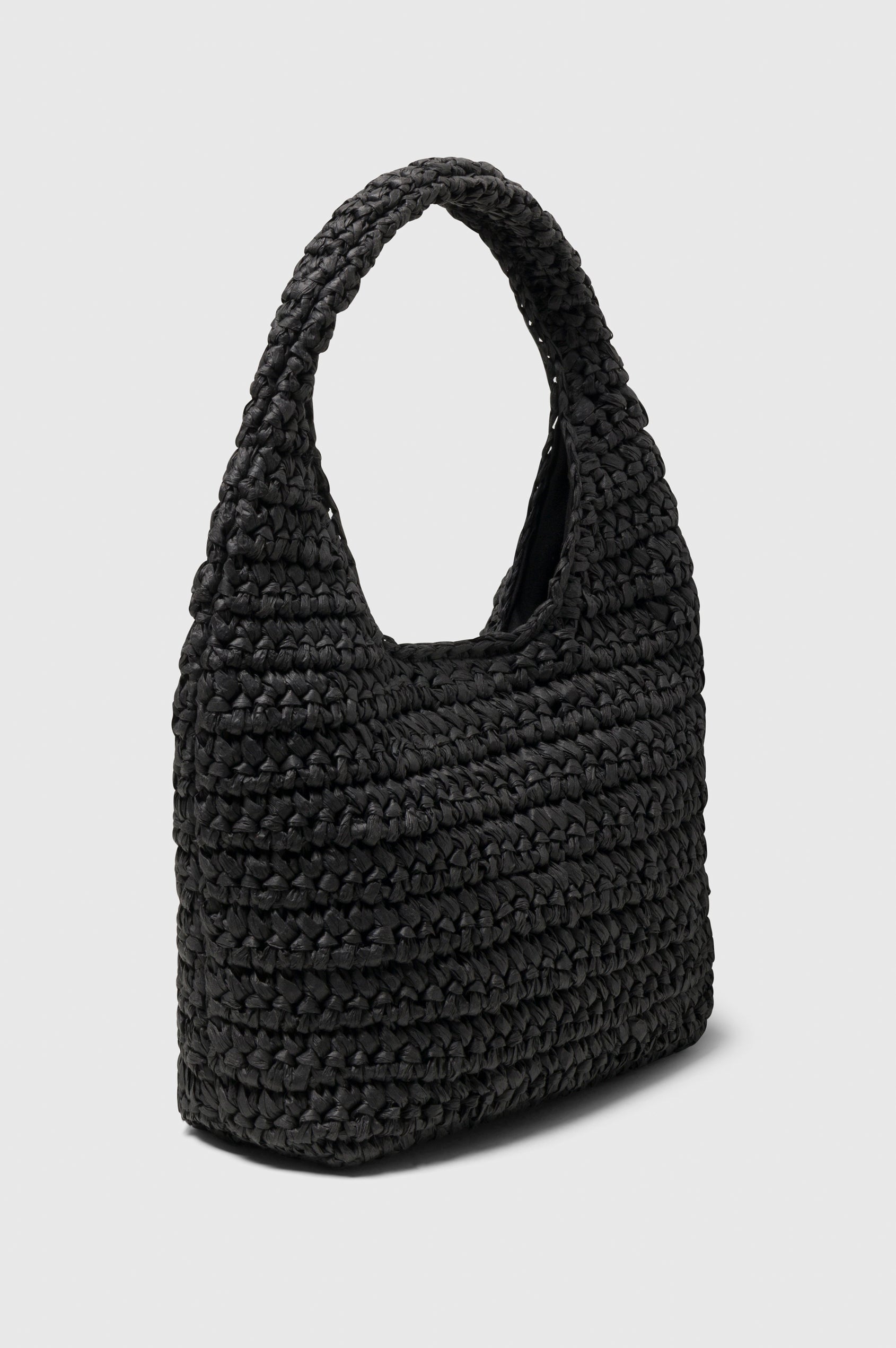 Palma rattan woven shoulder bag in Black - side view