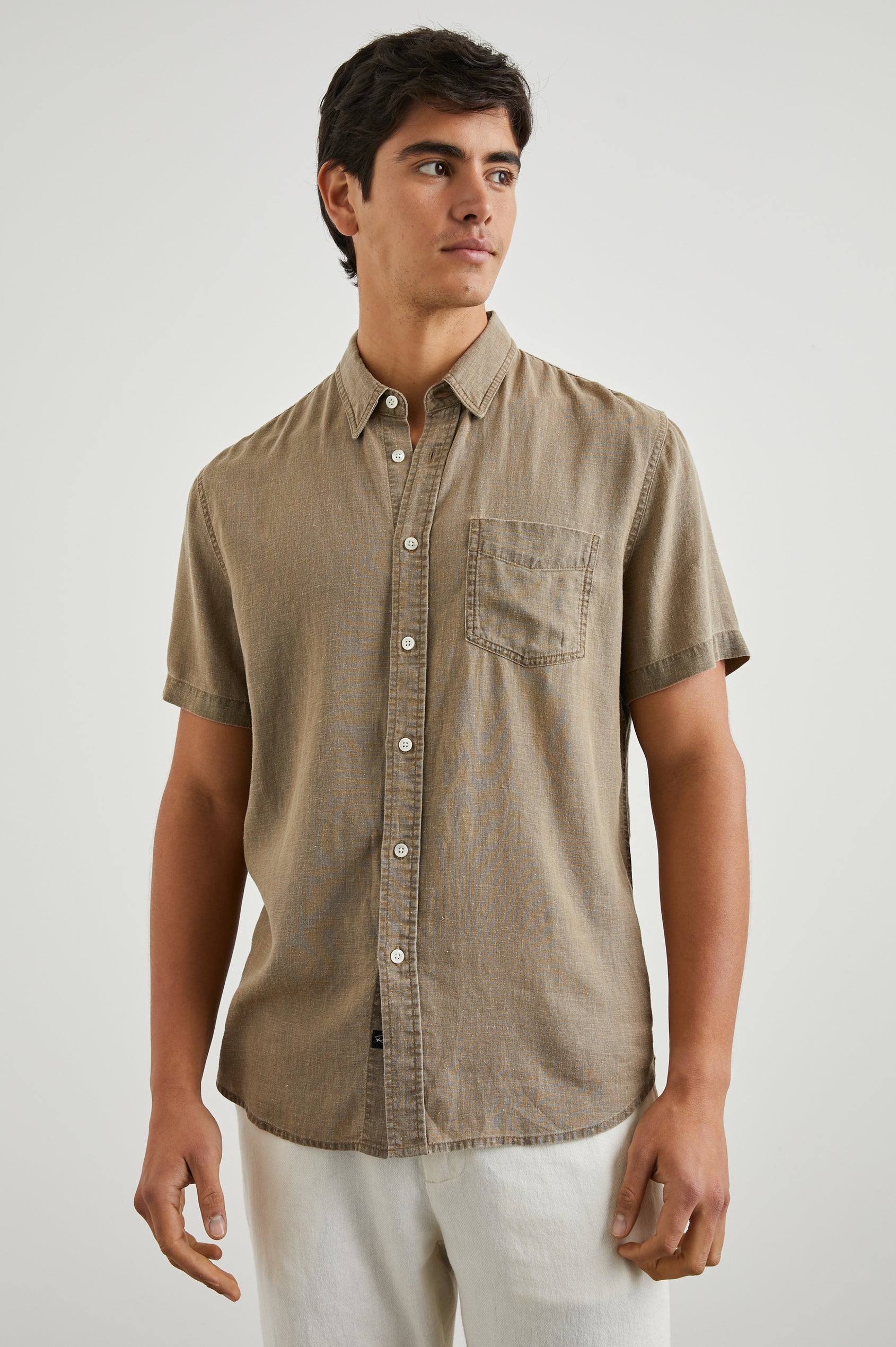 Paros Short-Sleeve Button Up with a Chest Patch Pocket in Ashwagandha Colorway, a Brown - Front View Featured on Model