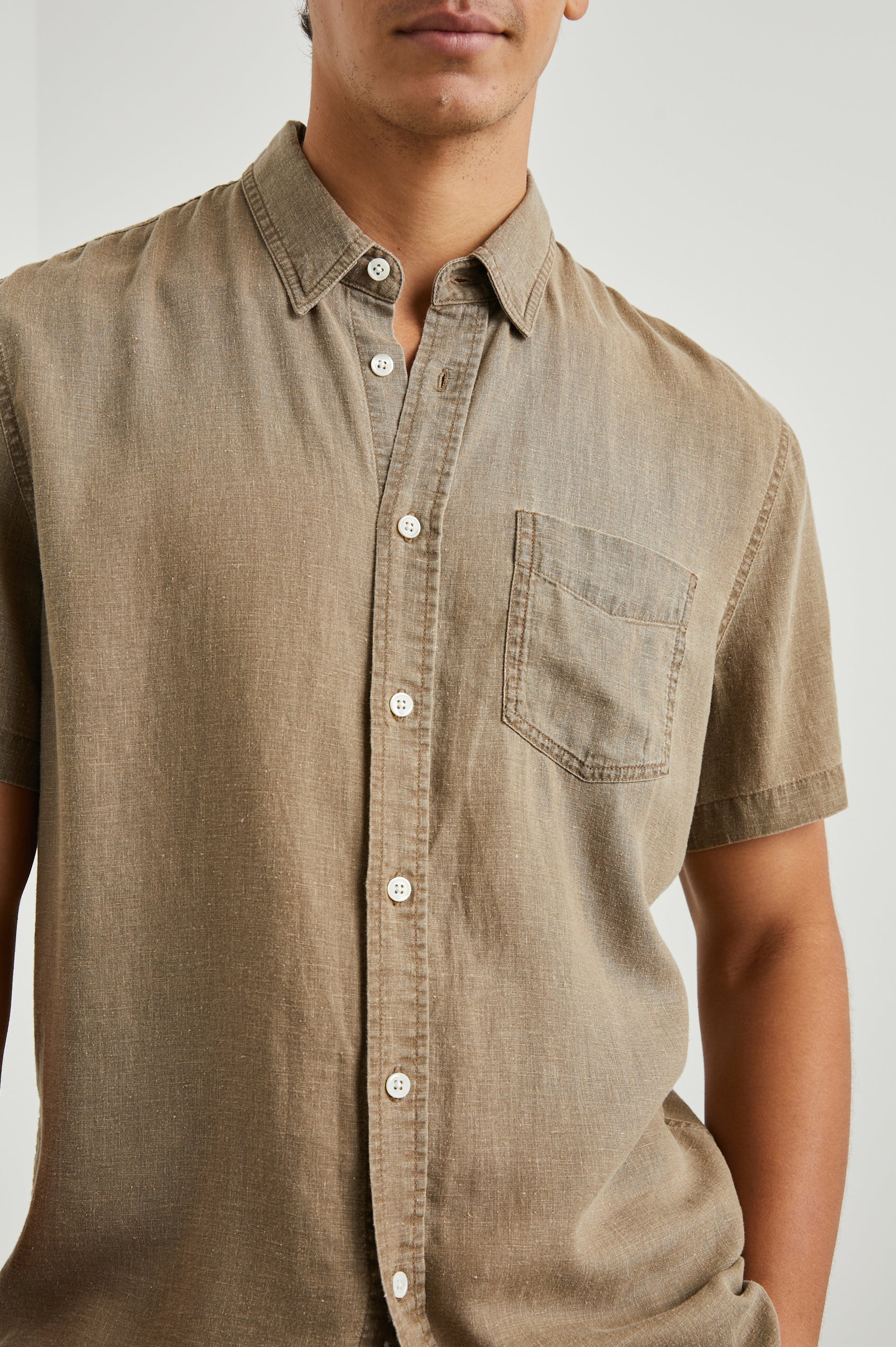 Paros Short-Sleeve Button Up with a Chest Patch Pocket in Ashwagandha Colorway, a Brown - Front View Featured on Model