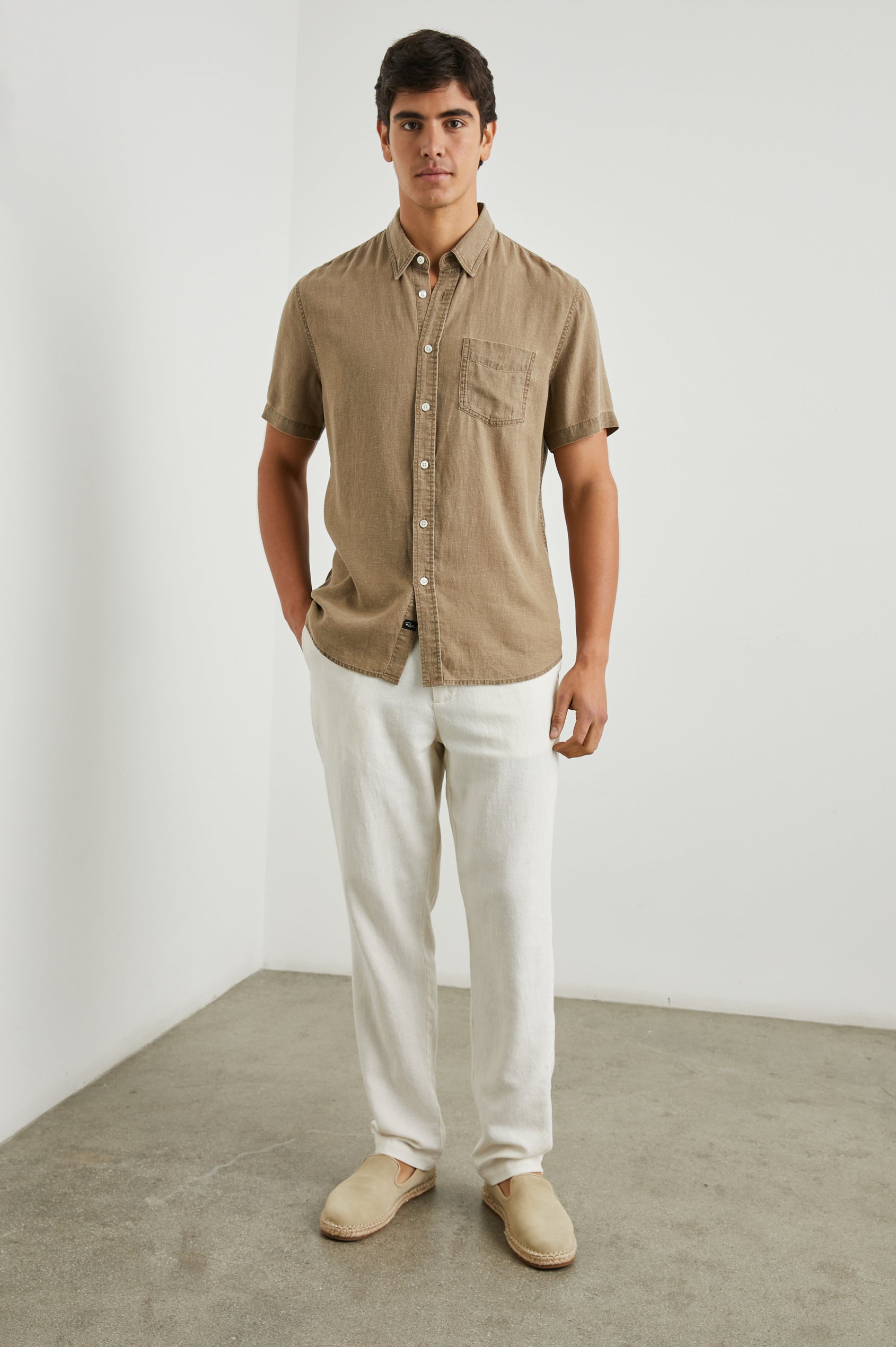 Paros Short-Sleeve Button Up with a Chest Patch Pocket in Ashwagandha Colorway, a Brown - Front Full Body View Featured on Model