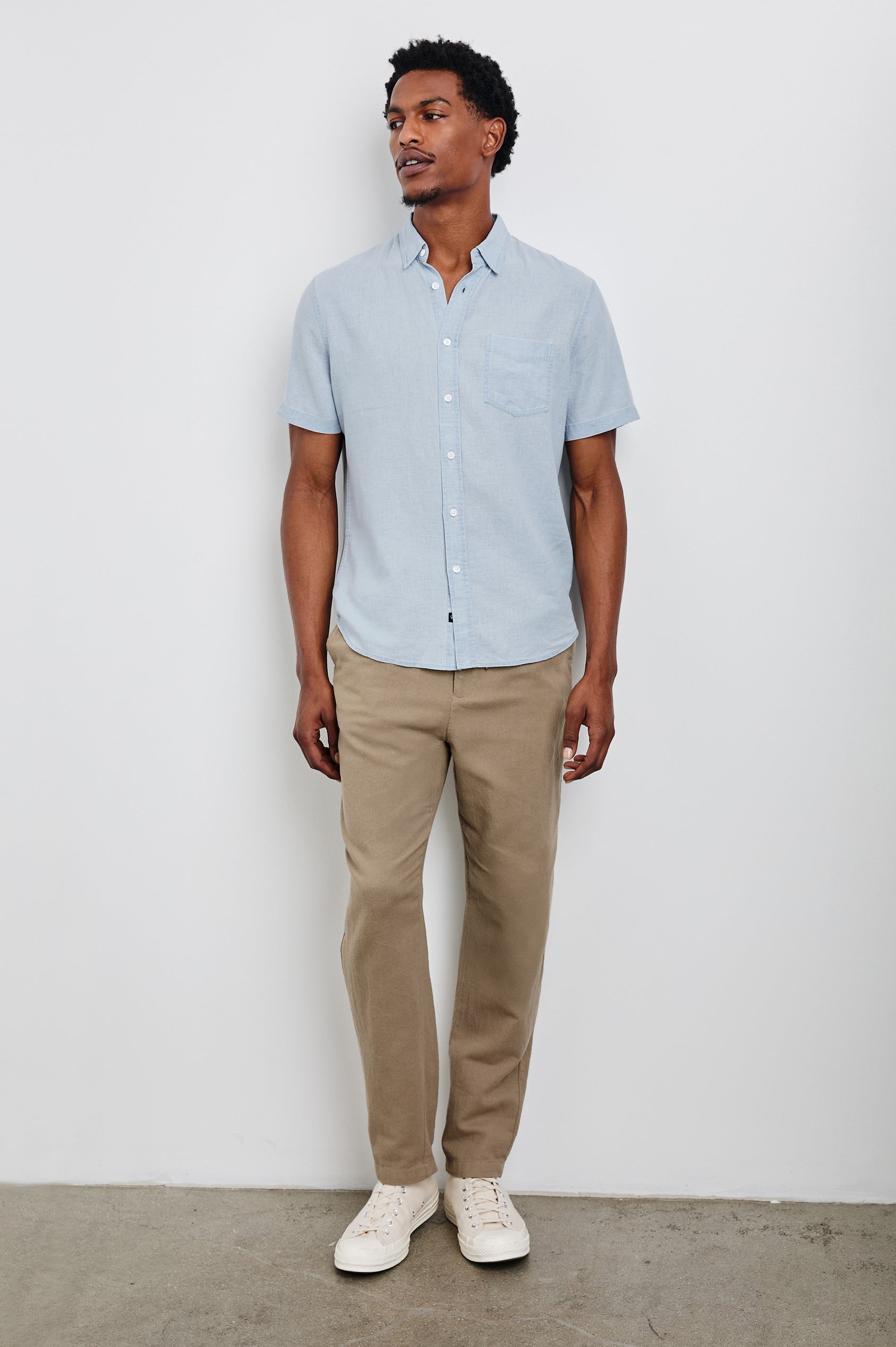 Paros button up short sleeve with front chest pocket in Blue Lagoon - full body front view on model
