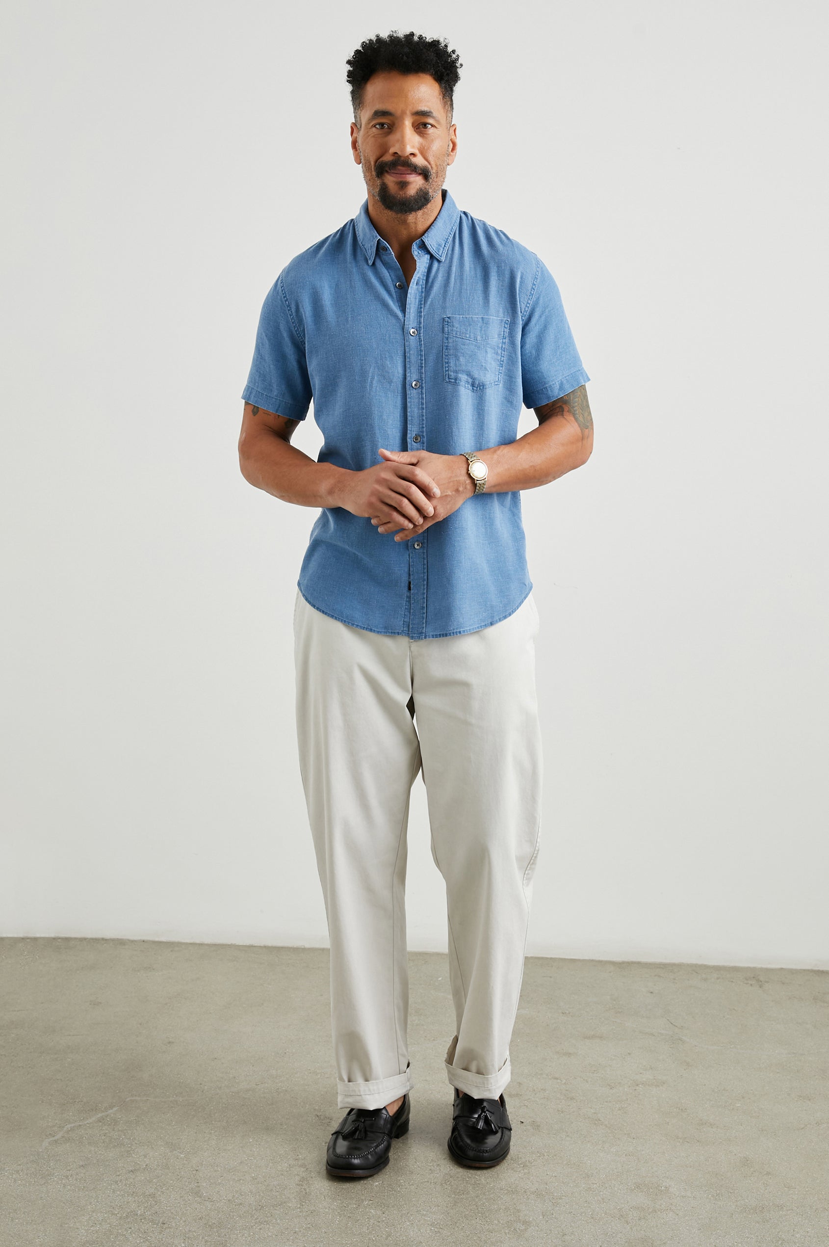 Paros Short-Sleeve Button Up with a Chest Patch Pocket in Celsius Colorway, a Blue - Front Full Body View Featured on Model
