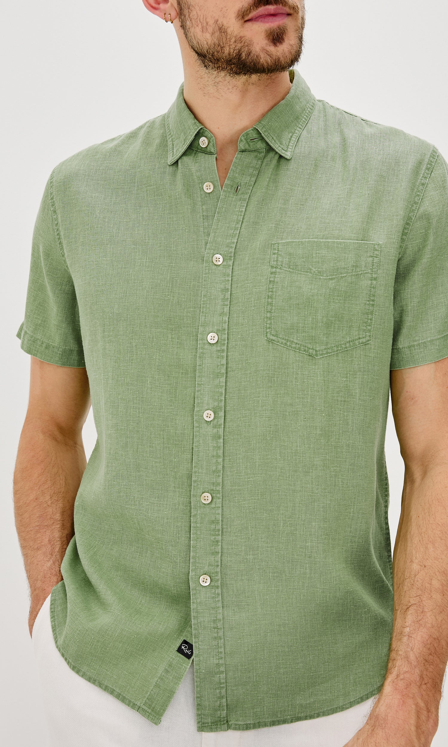 Paros button up short sleeve with front chest pocket and collar in Matcha Colorway- front view on model