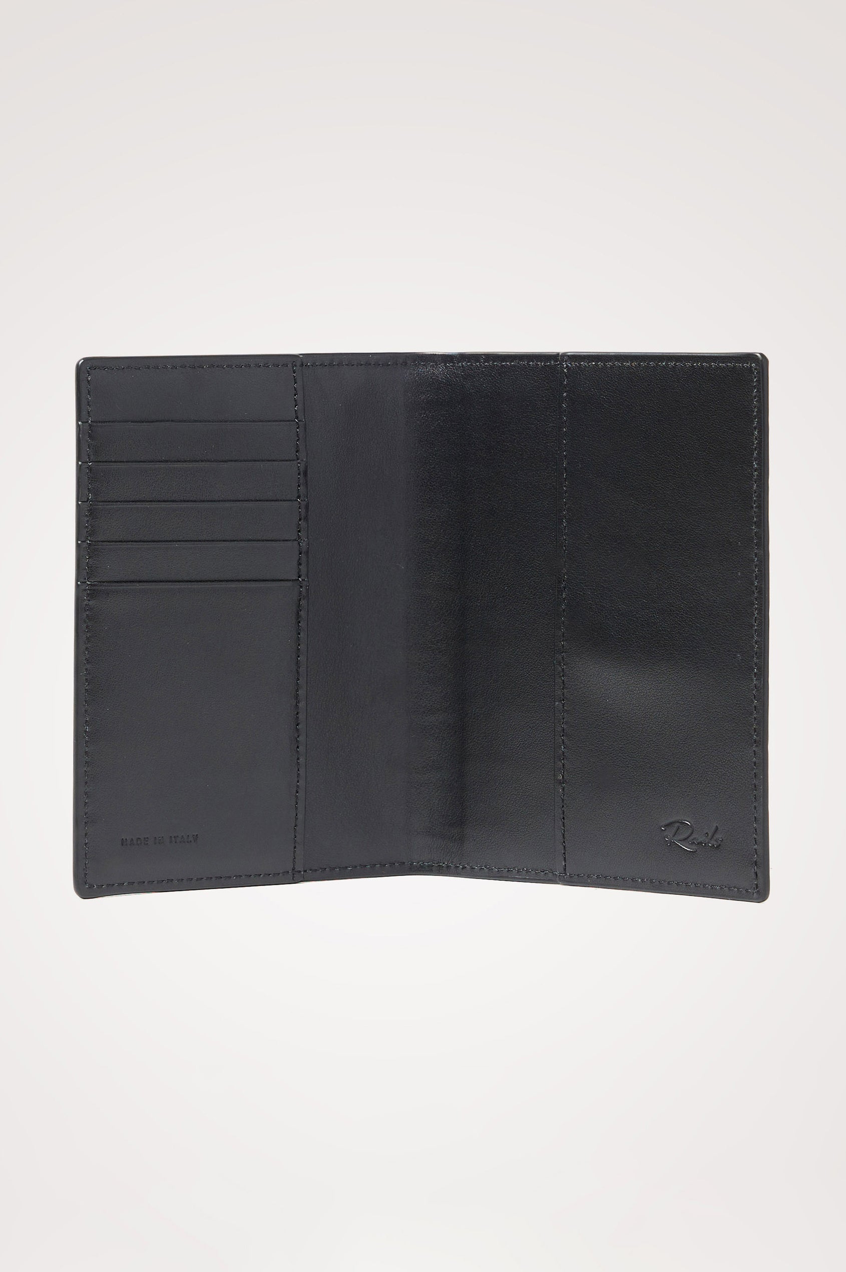 Passport Holder in Croc-Embossed Spanish Leather With Five Card Slots, Two Side Pockets, and Embossed Rails Logo in Black Croc Embossed Colorway - Interior view.