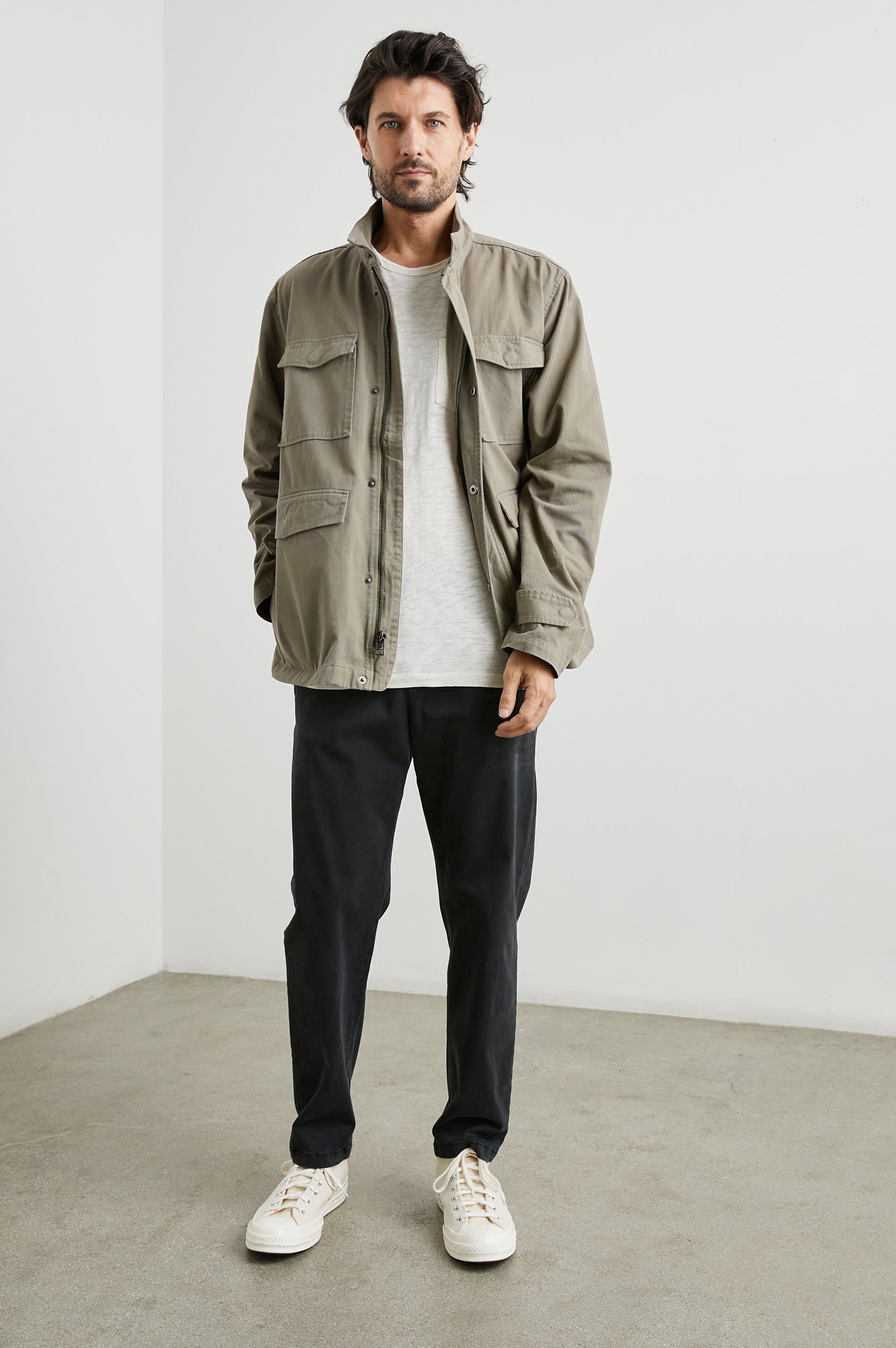 Paulsen Jacket with a Snap and Zip Closure, Two Front Snap Flap Pockets, Two Chest Snap Flap Pockets and a Snap Turnback in Sage Colorway - Front Full Body View Featured on Model 