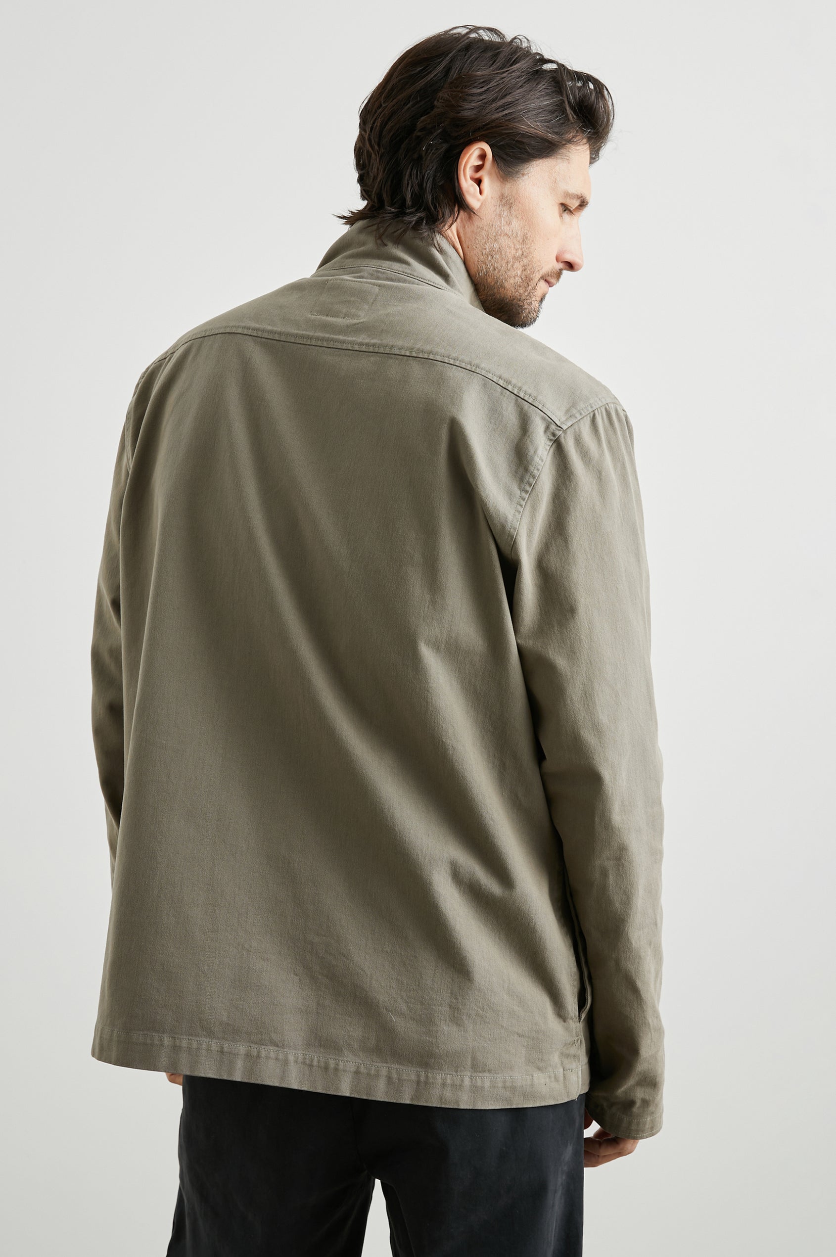 Paulsen Jacket with a Snap and Zip Closure, Two Front Snap Flap Pockets, Two Chest Snap Flap Pockets and a Snap Turnback in Sage Colorway - Back View Featured on Model 