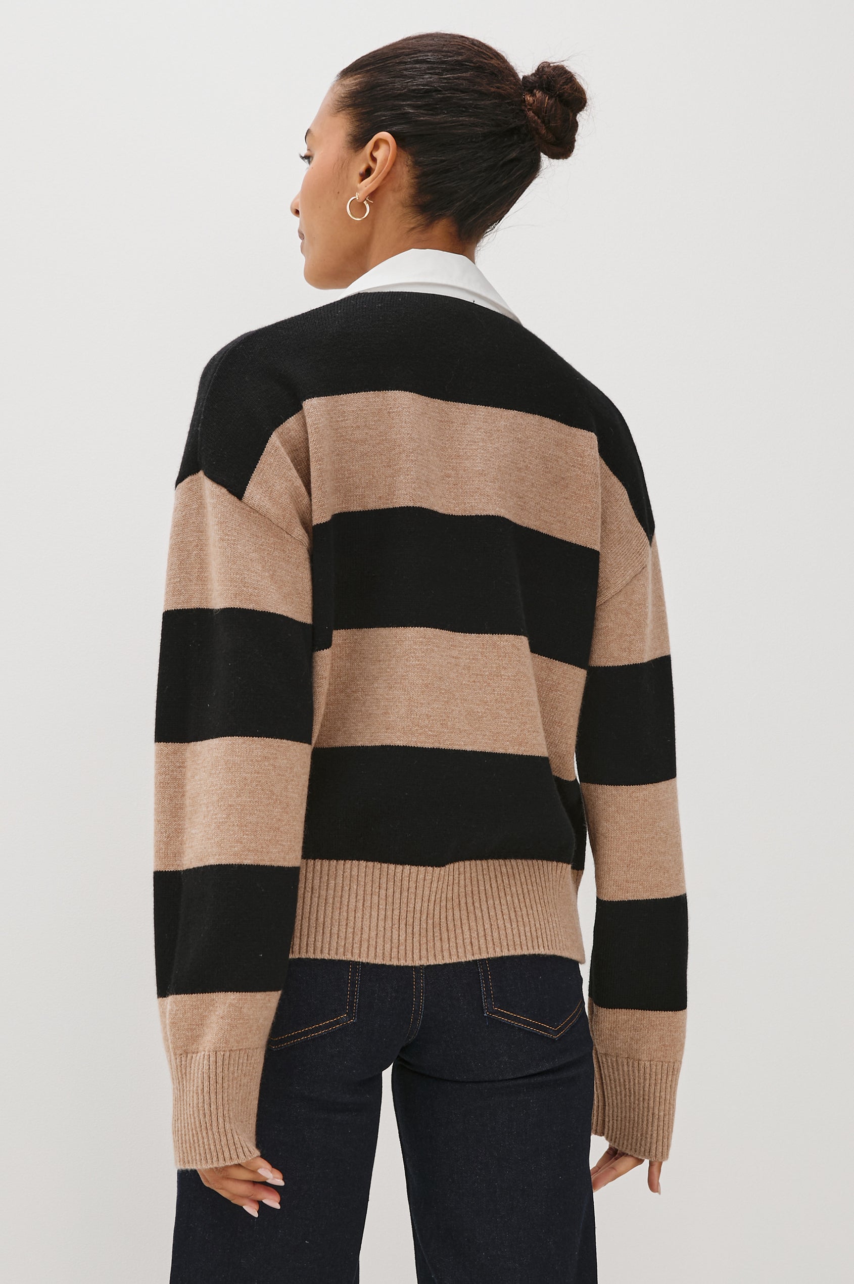 Cotton-cashmere henley sweater with relaxed fit. Design features black heritage-style stripes and a contrasting white cotton poplin collar. Back view on model.