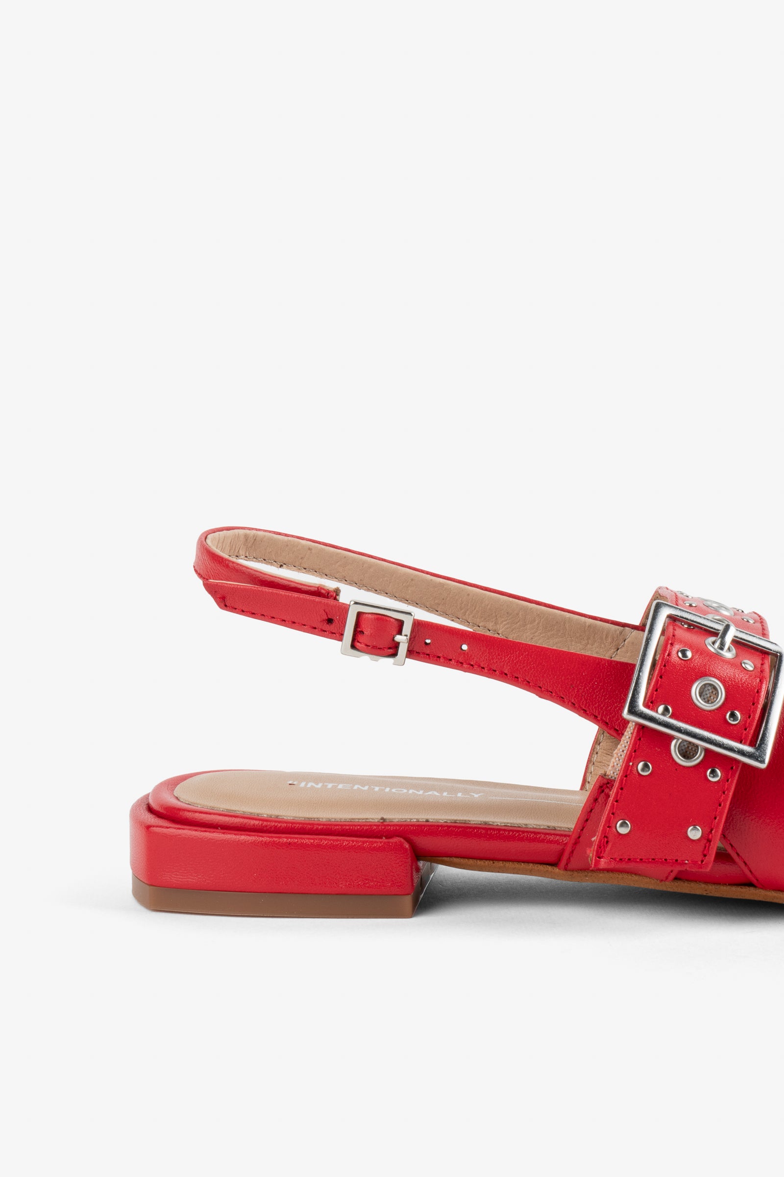 Intentionally Blank Pearl Ballet Flat with an Adjustable Slingback Strap, a Studded Upper Buckle Strap, a Small Heel and a Square Toe in Cherry Colorway - Side View 
