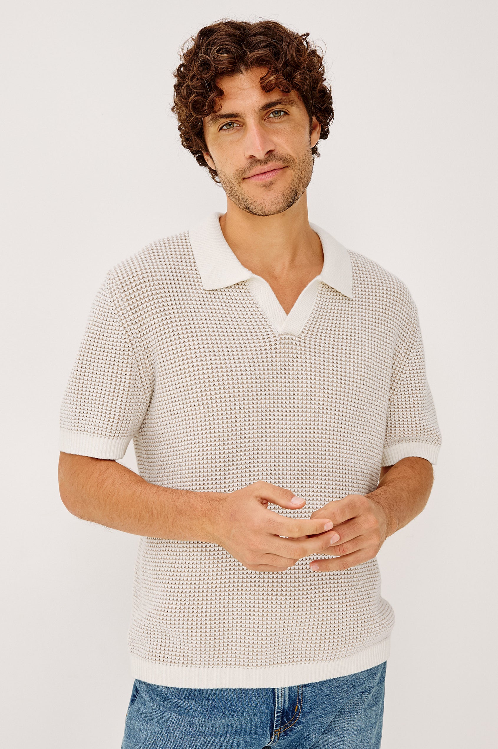 Pearson Polo Shirt in Textured Knit With Loose Fit, Short Sleeves, and Open-Placket Collar in White Sands Colorway - Upper Body Front View Featured on Model