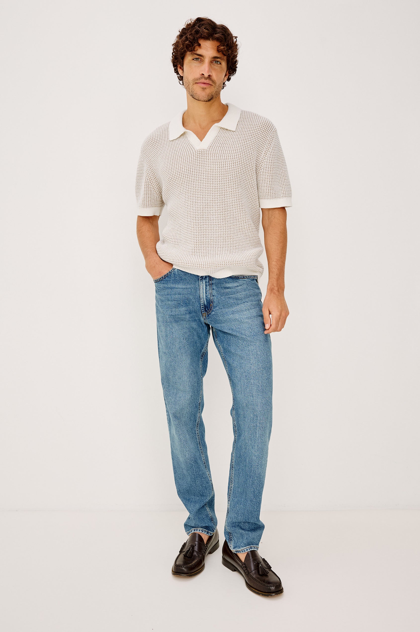 Pearson Polo Shirt in Textured Knit With Loose Fit, Short Sleeves, and Open-Placket Collar in White Sands Colorway - Full Body Front View Featured on Model