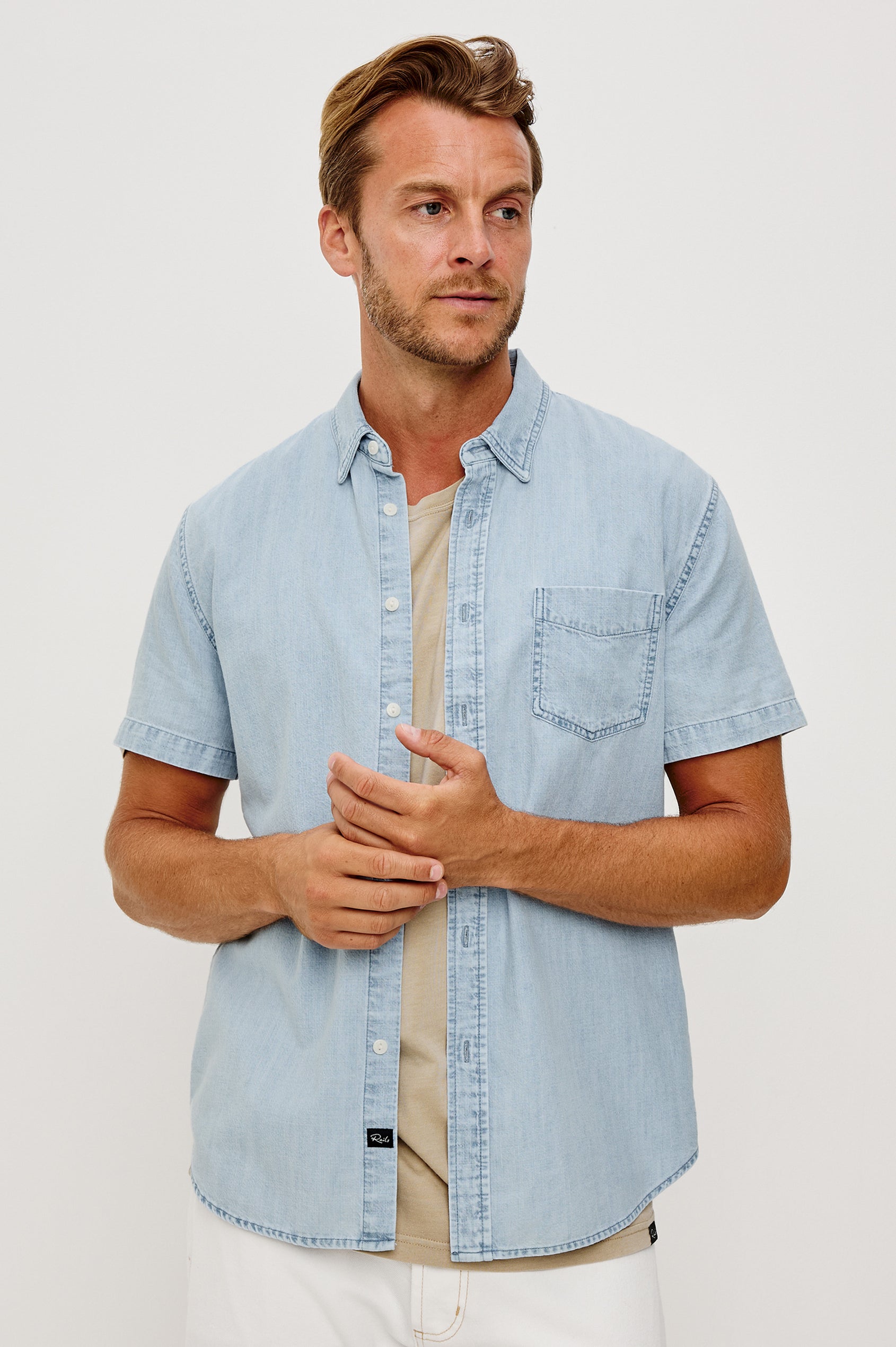 Penn Button-Up Shirt in Rope-Dye Yarn With Collar, Short Sleeves, and Classic Fit in Light Vintage Wash Colorway - Upper Body Front View Featured on Model