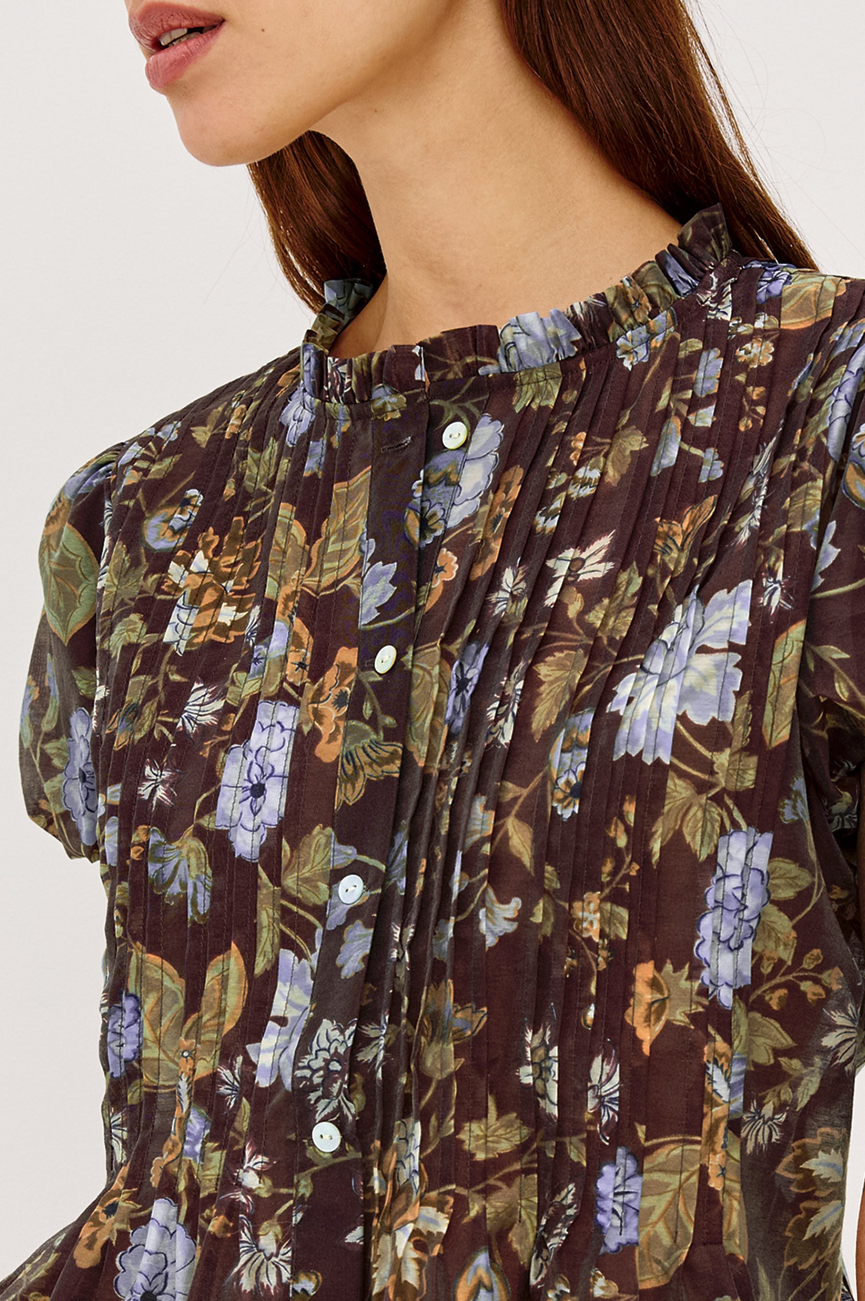 Pepper Shirt in Cotton Poplin With Loose Boxy Fit, Pintuck Detailing, Puff Cap Sleeves, Center-Front Buttons, and Soft Peplum Hem in Willow Colorway - Upper Body Close Up Front View Featured on Model