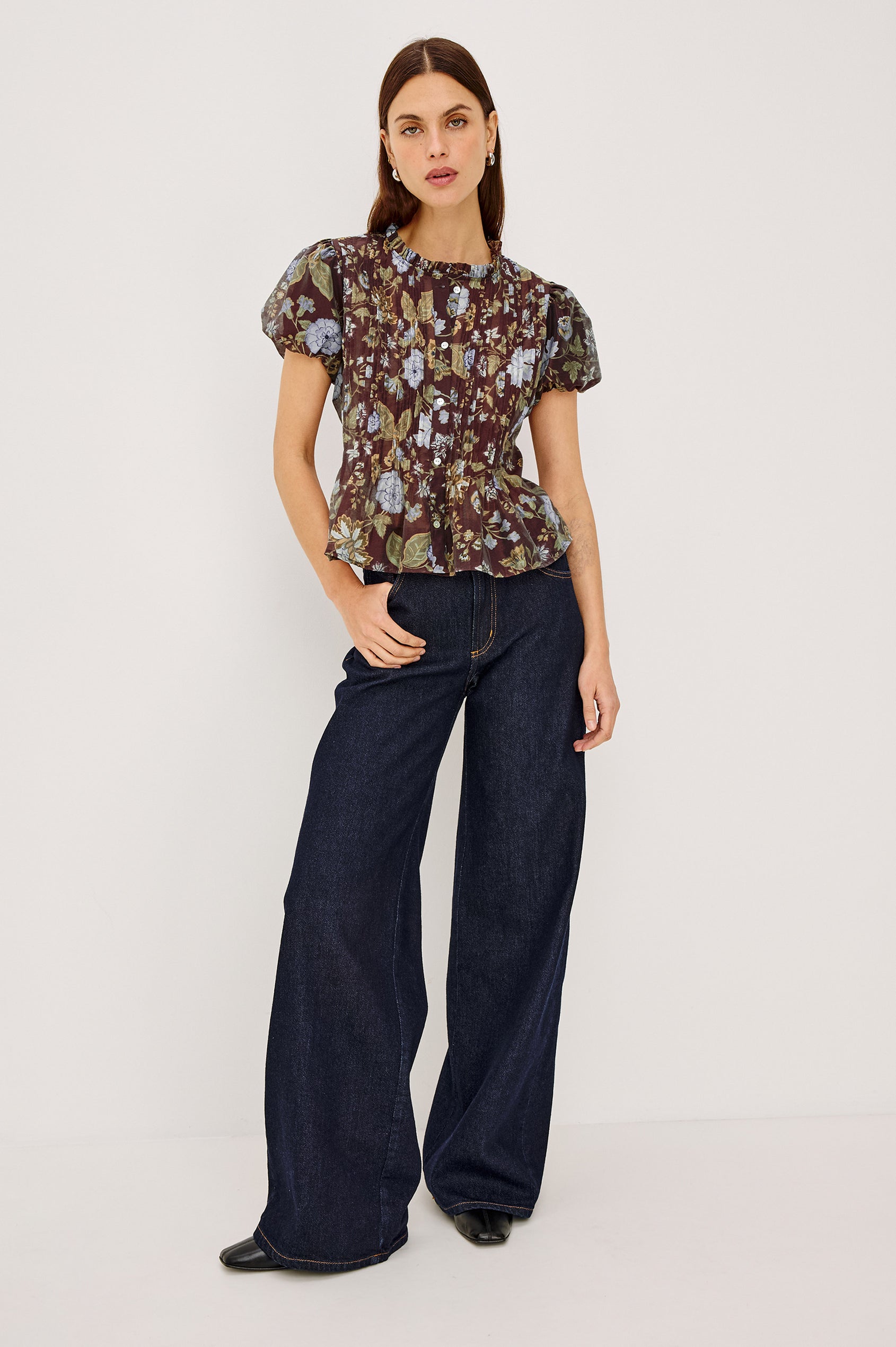 Pepper Shirt in Cotton Poplin With Loose Boxy Fit, Pintuck Detailing, Puff Cap Sleeves, Center-Front Buttons, and Soft Peplum Hem in Willow Colorway - Full Body Front View Featured on Model