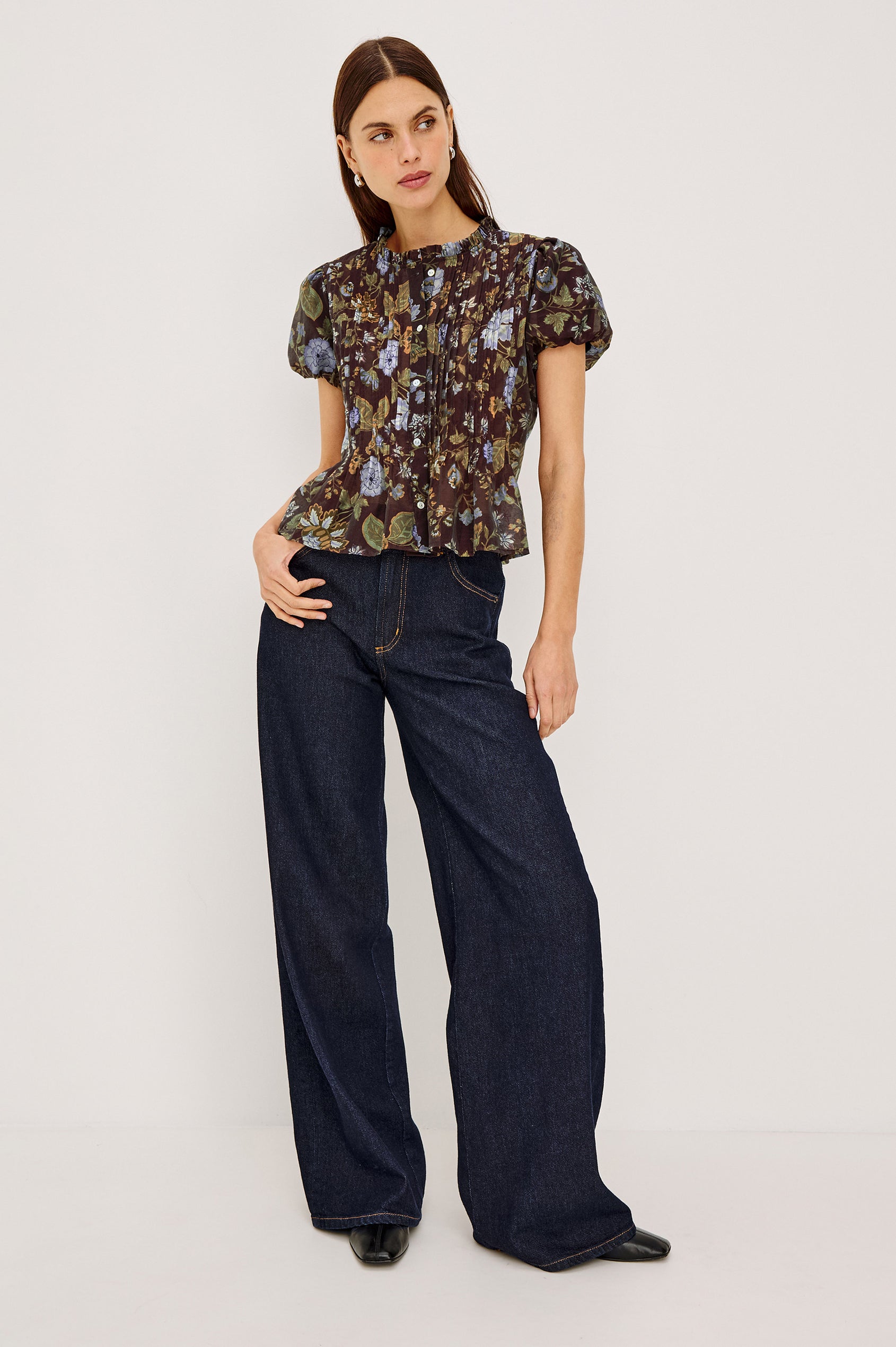 Pepper Shirt in Cotton Poplin With Loose Boxy Fit, Pintuck Detailing, Puff Cap Sleeves, Center-Front Buttons, and Soft Peplum Hem in Willow Colorway - Full Body Front View Featured on Model