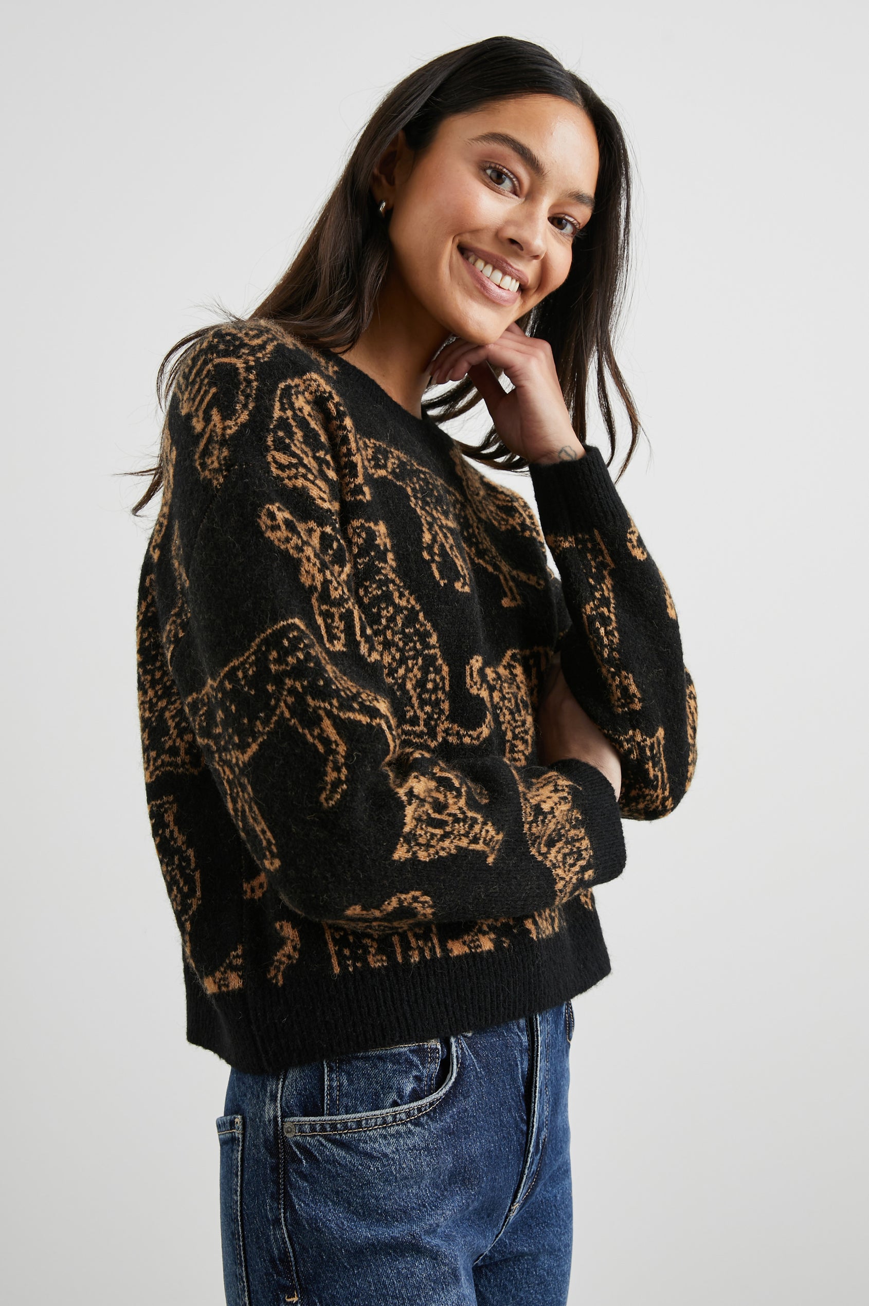 Perci Long-Sleeved Sweater with Crew Neck and Ribbed Trim in Camel Wild Cats Colorway, Camel Wild Cats on Black - Front View Featured on Model