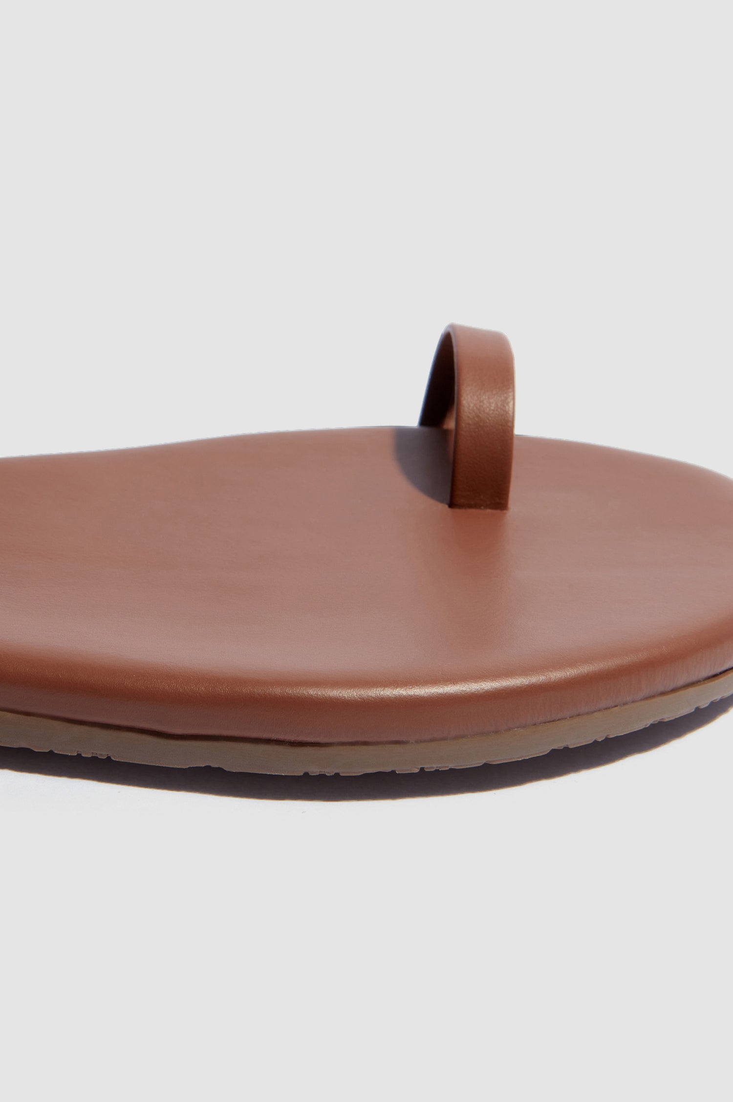 Phoebe leather sandal with toe ring and crossed ankle strap with buckle in Heatwave - close up of toe detail