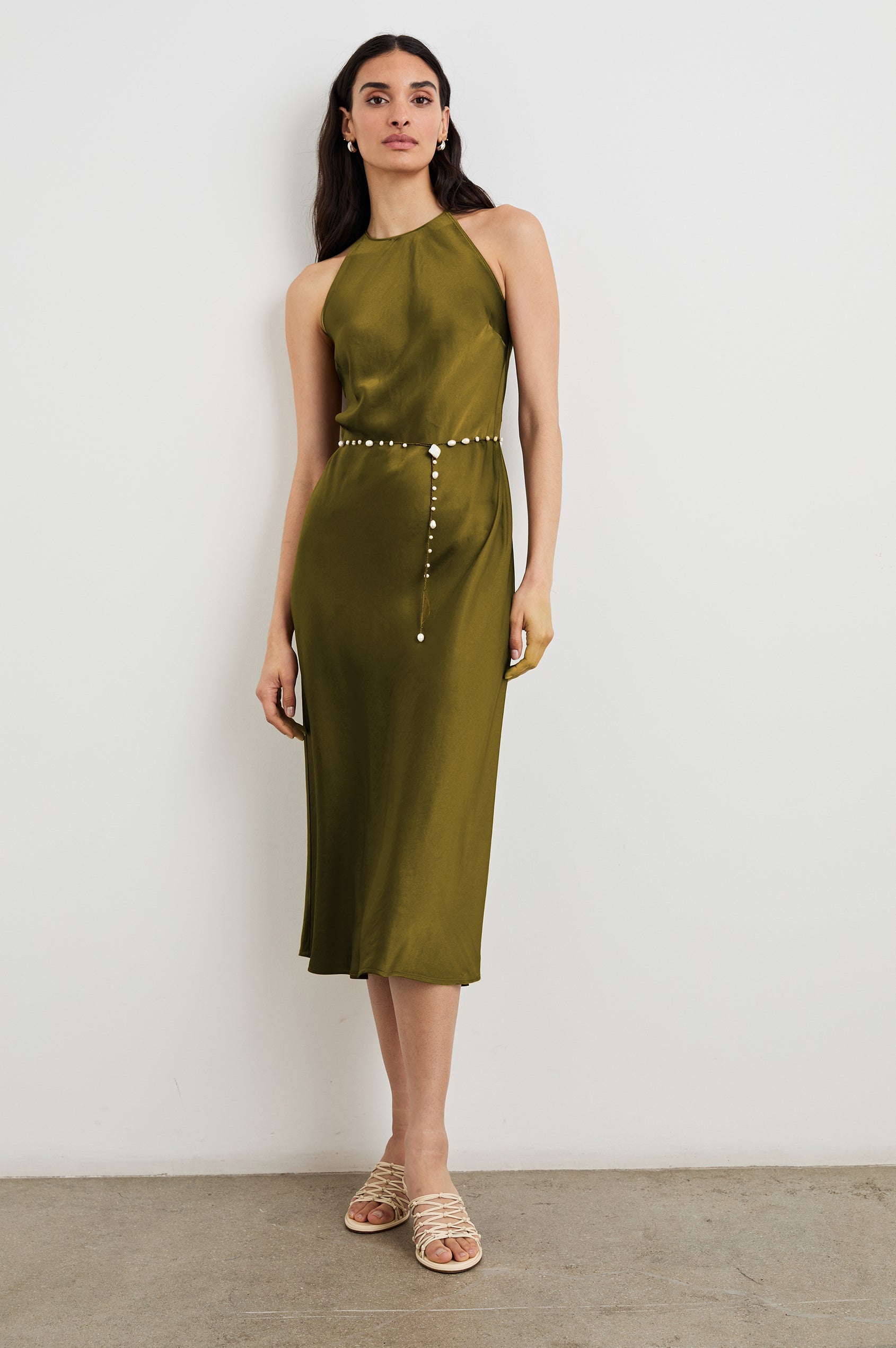 Pia Sleeveless Midi Dress with a Crew Neck and Back Button Closure with Keyhole in Fern Colorway - Front Full Body View Featured on Model