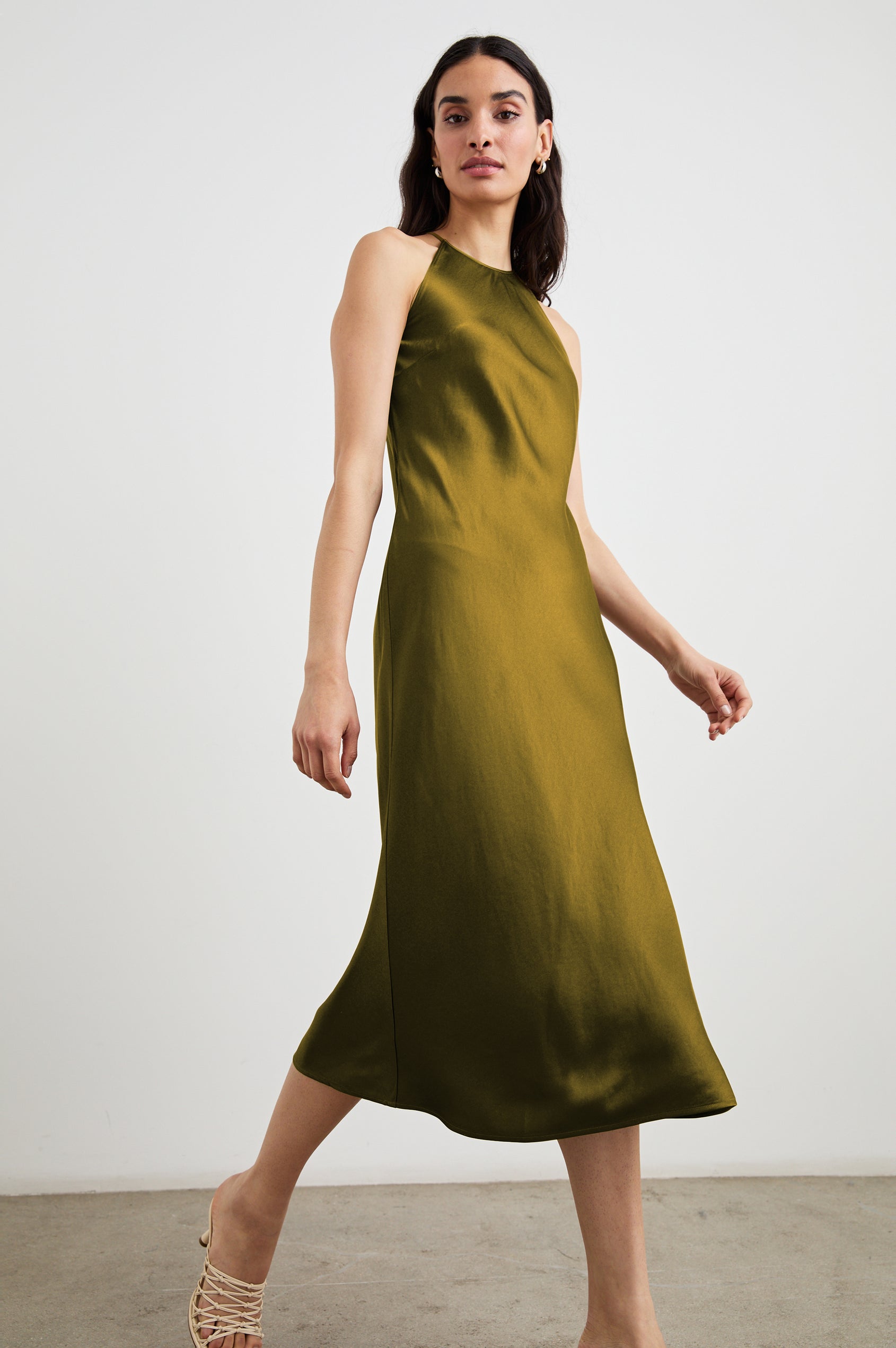 Pia Sleeveless Midi Dress with a Crew Neck and Back Button Closure with Keyhole in Fern Colorway - Front Full Body View Featured on Model