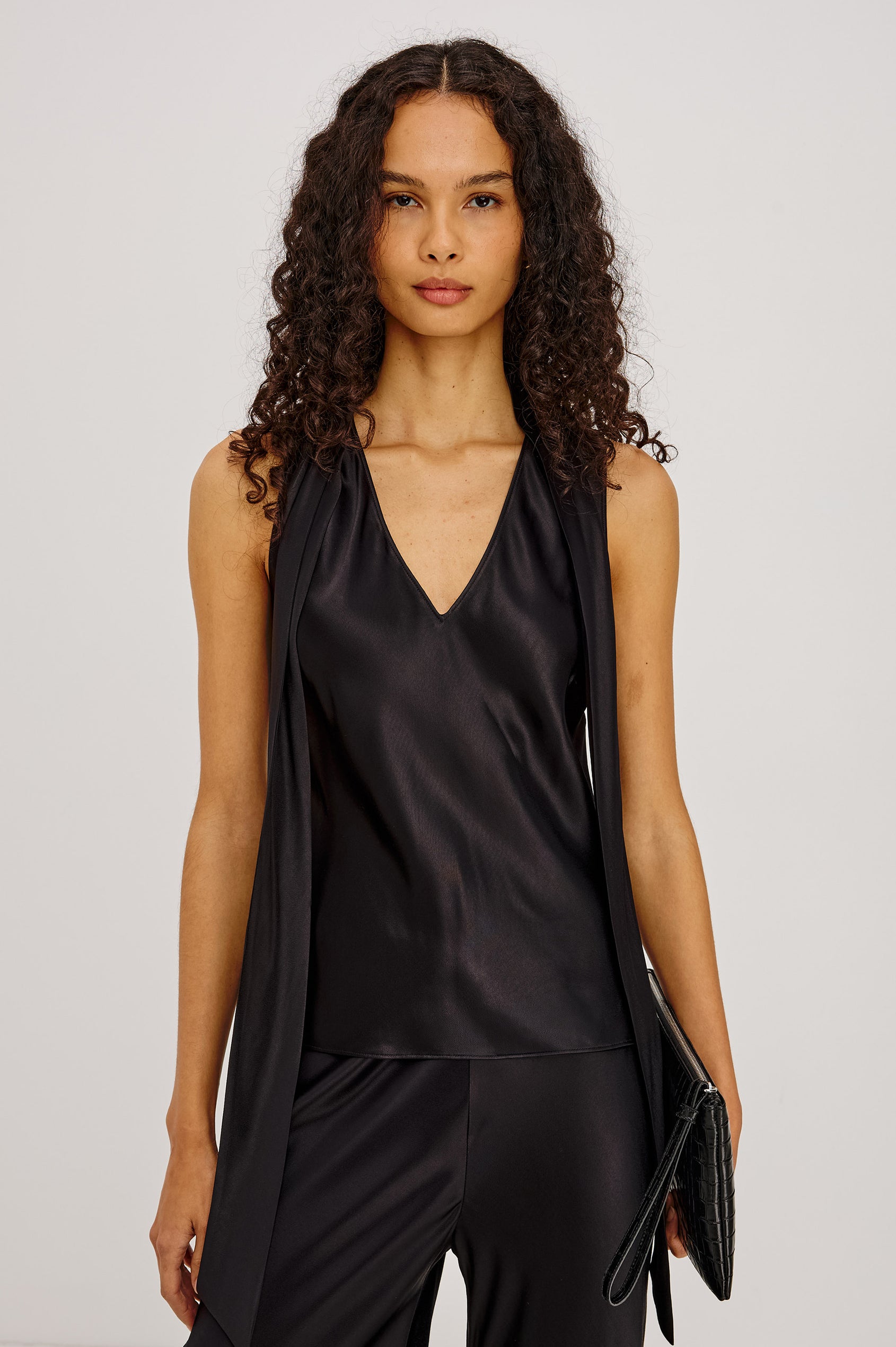 Poppy Shirt in Satin-Back Crepe With Deep V-Neckline, Attached Self-Tie Scarf, and Bias Cut in Black Colorway - Upper Body Front View Featured on Model