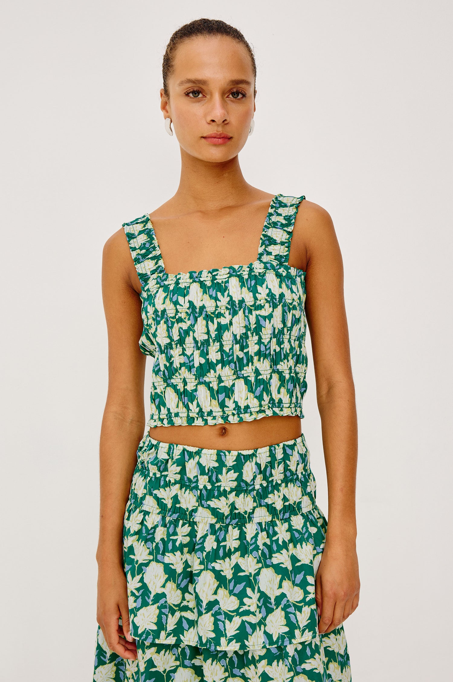 Quinn Cropped Tank Top in Cotton Poplin With Square Neckline, Sand mocked Bodice and Wide Shoulder Straps in Green Mayflower Print - Upper Body Front View Featured on Model