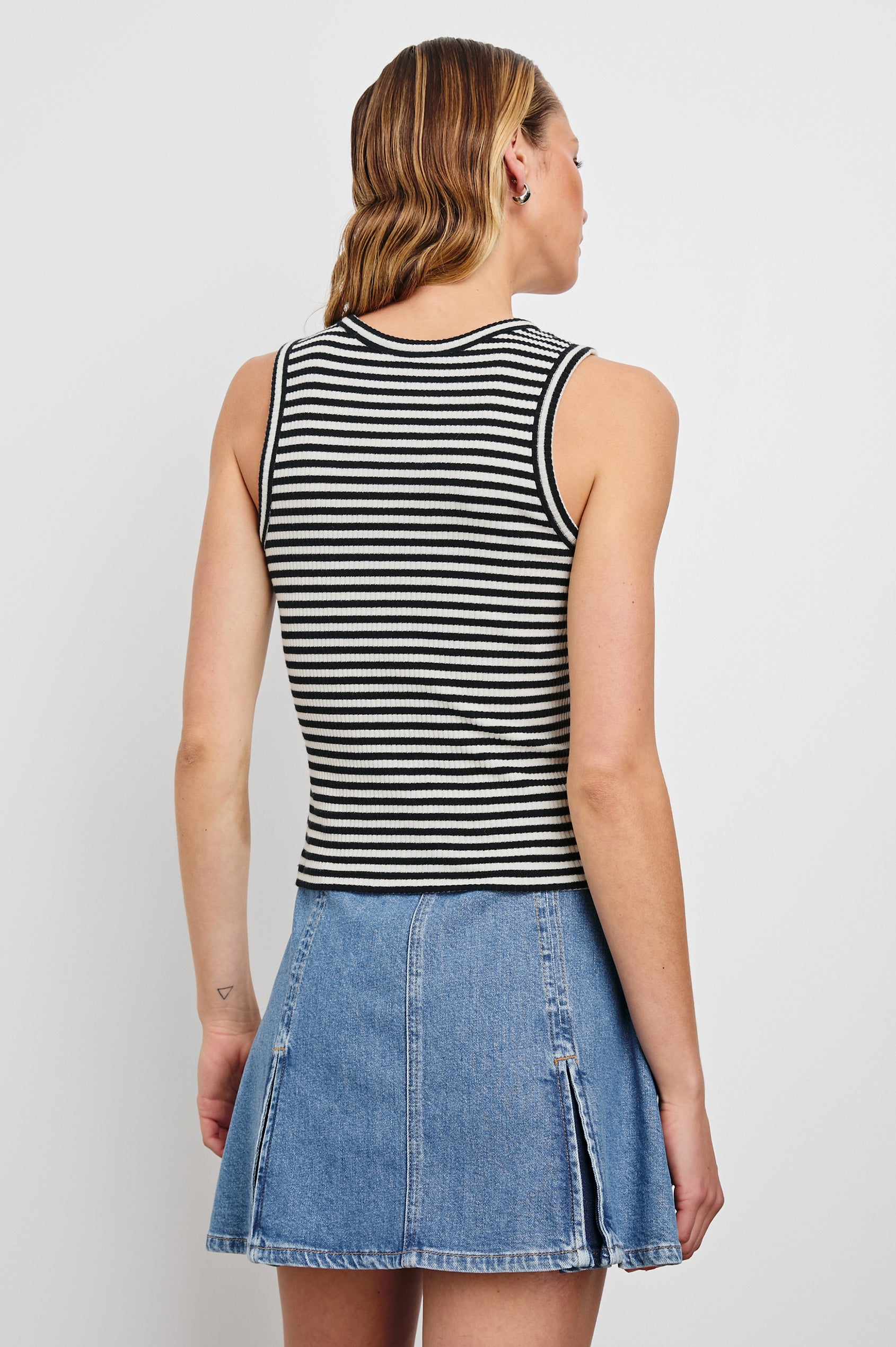 The Racer Ribbed Tank with a Crew Neckline in Black Birch Stripe Colorway, Horizontal Stripes - Back View Featured on Model