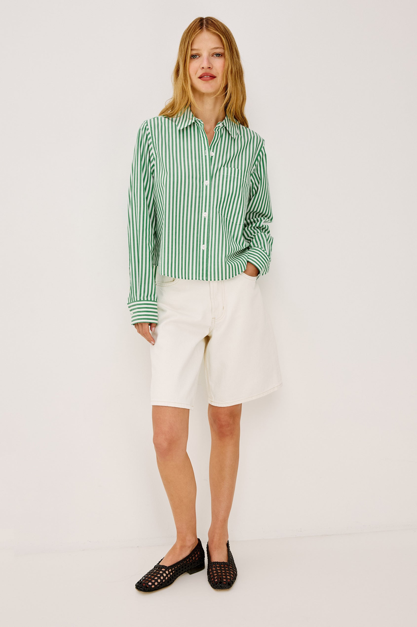 Ramy Crop Shirt in Cotton Poplin With Button-Up Placket, Collar, Chest Patch Pocket, Long Sleeves, and a Loose, Boxy Fit in Emerald Stripe Colorway - Upper Body Front View Featured on Model
