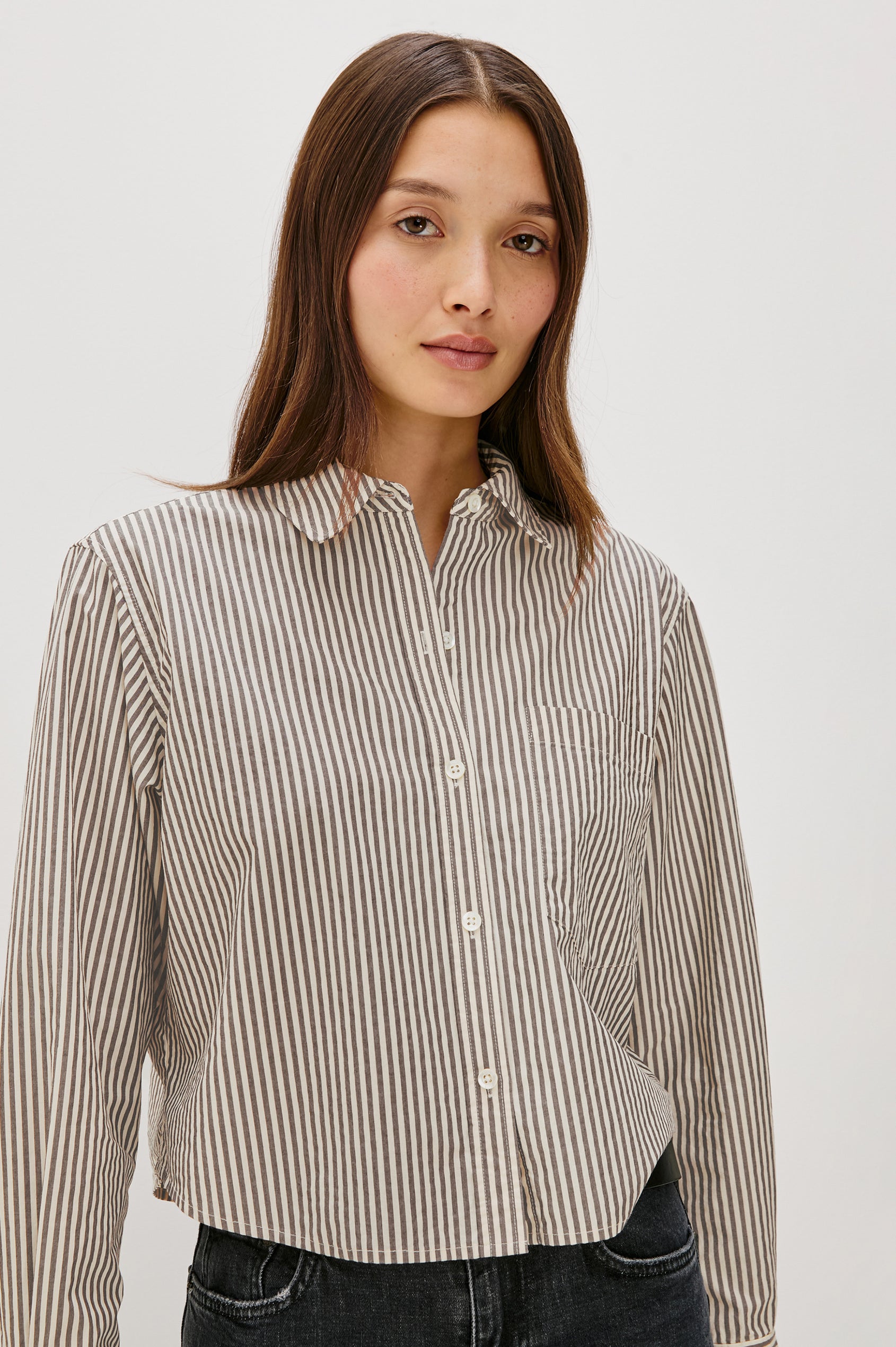 Ramy Long Sleeve Poplin Cotton Shirt With Shortened Hem In Colorway Noir Stripe - Front View Featured On Model