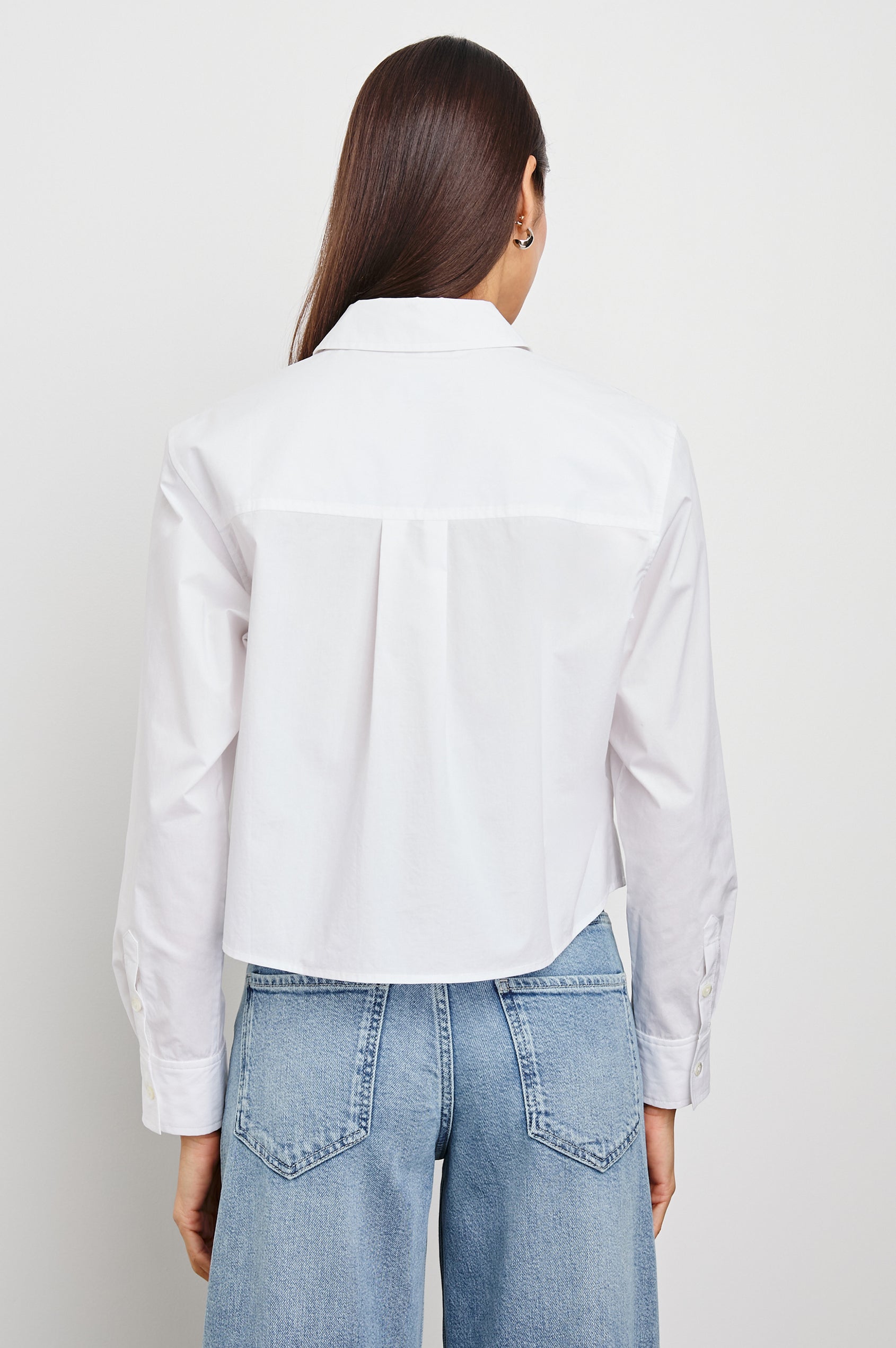 Ramy Long Sleeve Poplin Cotton Shirt With Shortened Hem In Colorway White - Back View Featured On Model
