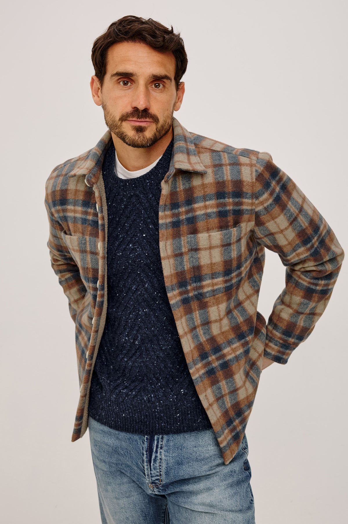 Ranger Jacket With Brushed Poly Outer Shell, Vegan Sherpa Lining, Quilted Long Sleeves, Point Collar, and Front Buttons in Robin Oat Colorway - Upper Body Front View Featured on Model.