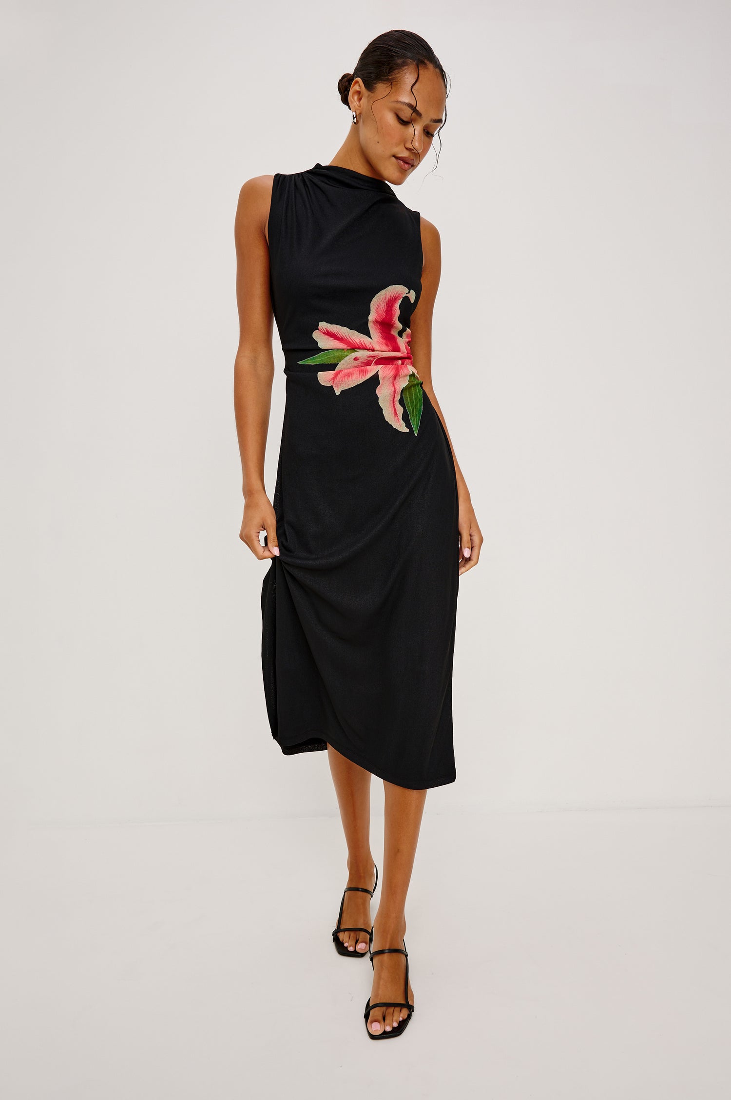 Rebecca Midi Dress With High Cowl Neckline, Sleeveless Cut, Side Slit, and Floral Printed at Front in Peach Lily Colorway - Full Body Front View Featured on Model