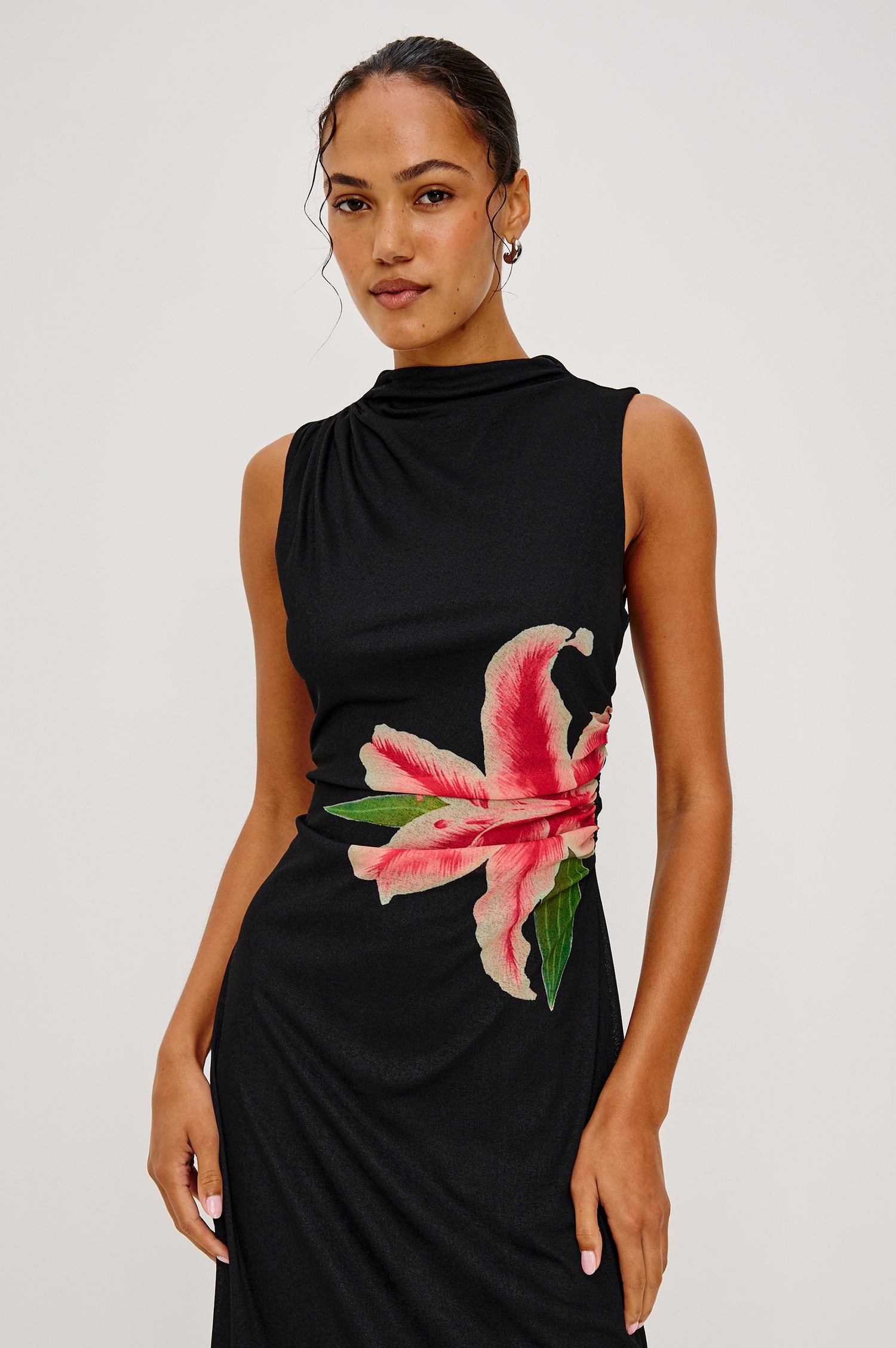 Rebecca Midi Dress With High Cowl Neckline, Sleeveless Cut, Side Slit, and Floral Printed at Front in Peach Lily Colorway - Upper Body Front View Featured on Model