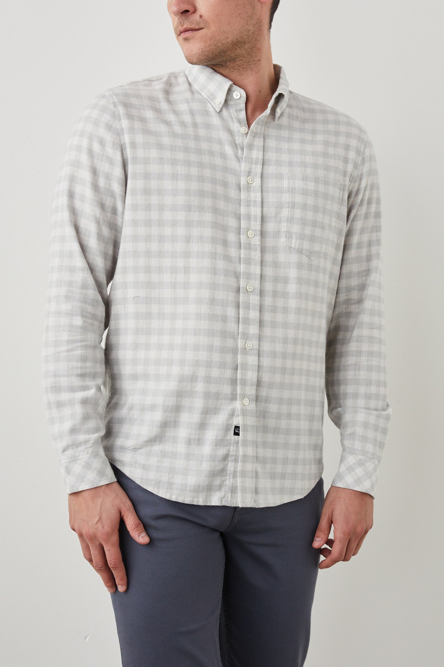 Reid Long-Sleeve Button Up with a Patch Pocket in Alloy White Melange Colorway, a Grey and White plaid - Front View Featured on Model