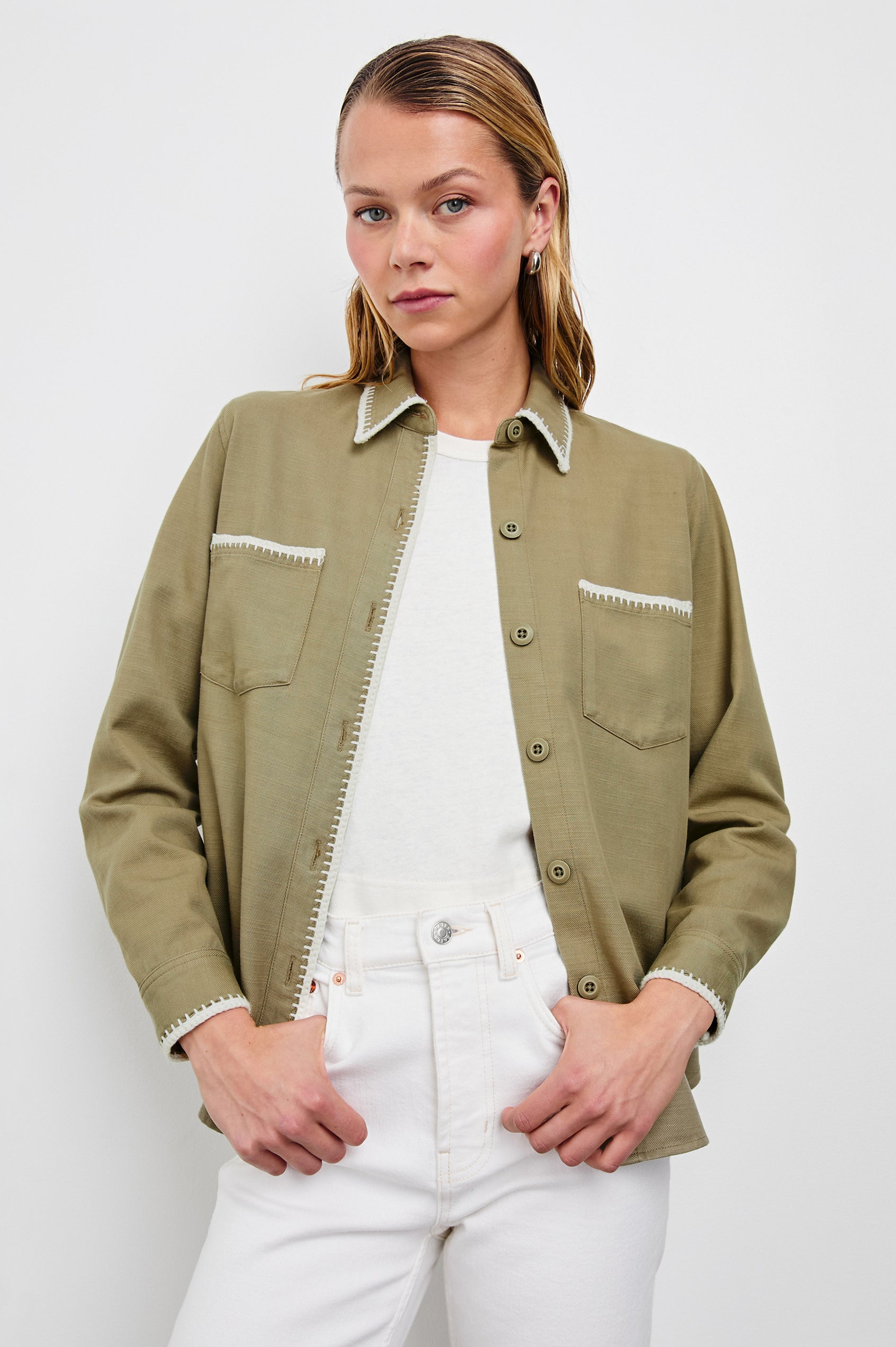 Reigh Jacket with Two Chest Patch Pockets and Button Closure in Pale Olive Colorway with White Trim - Front View Featured on Model