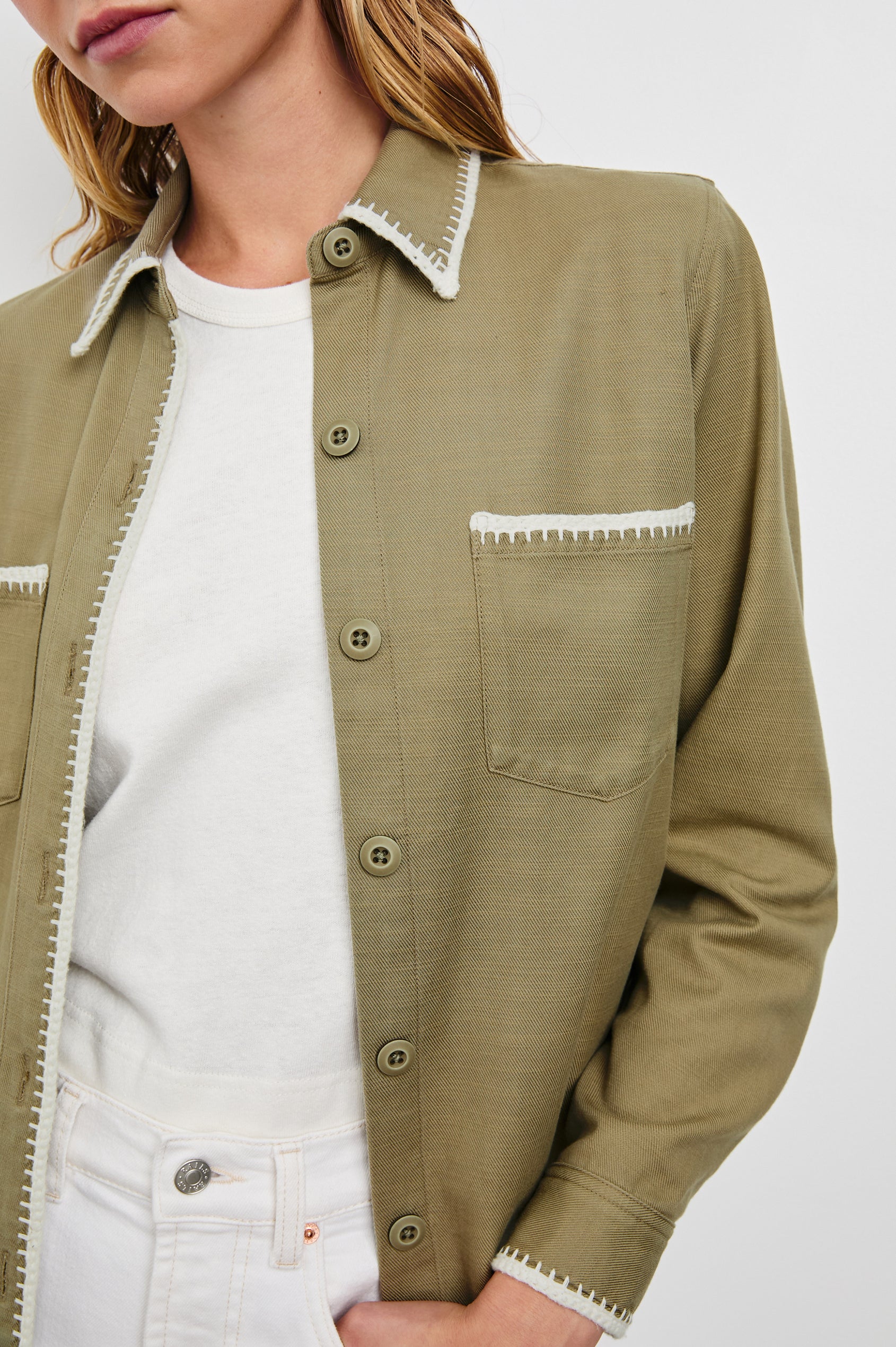 Reigh Jacket with Two Chest Patch Pockets and Button Closure in Pale Olive Colorway with White Trim - Front View Featured on Model