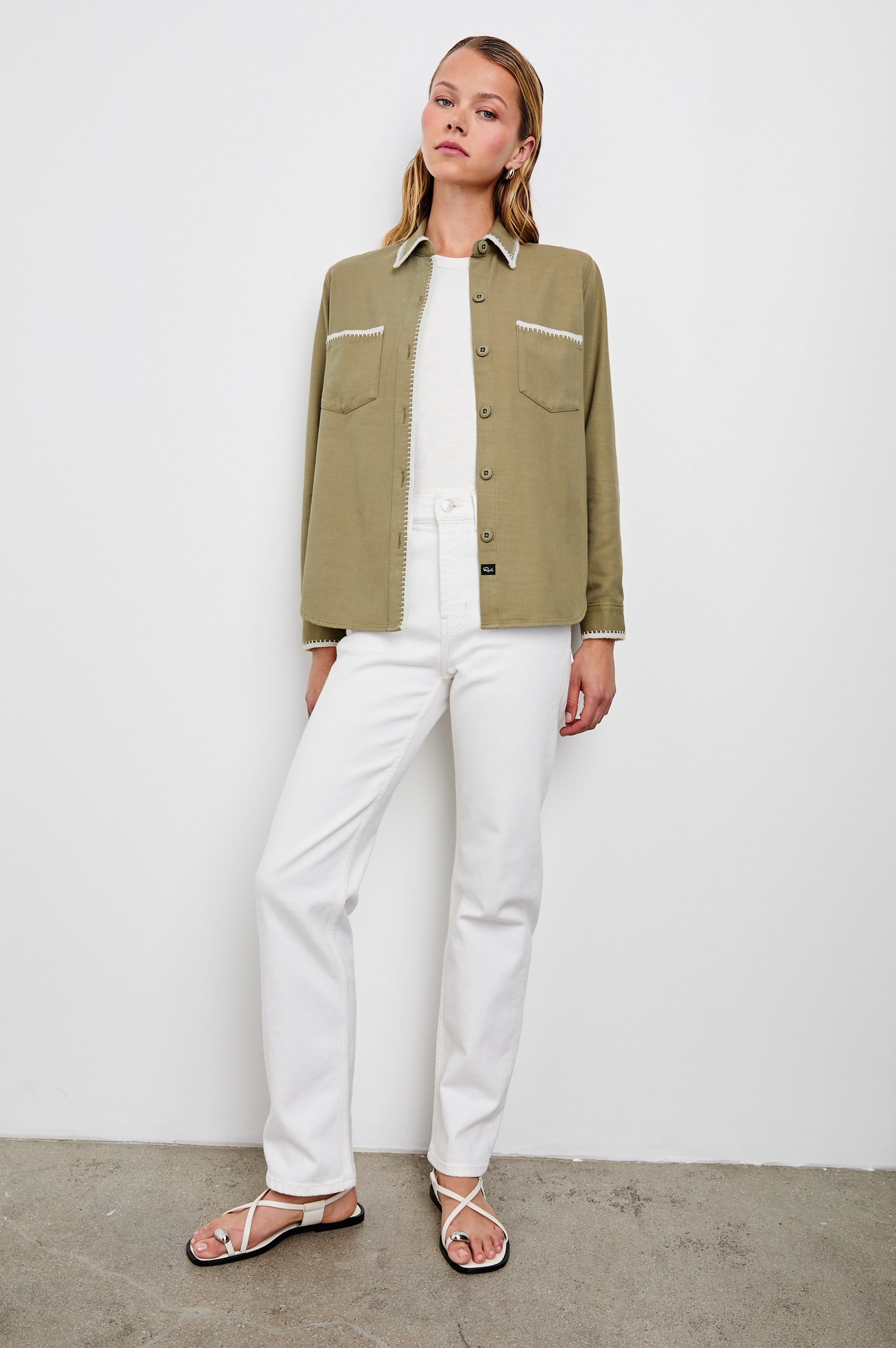 Reigh Jacket with Two Chest Patch Pockets and Button Closure in Pale Olive Colorway with White Trim - Front Full Body View Featured on Model