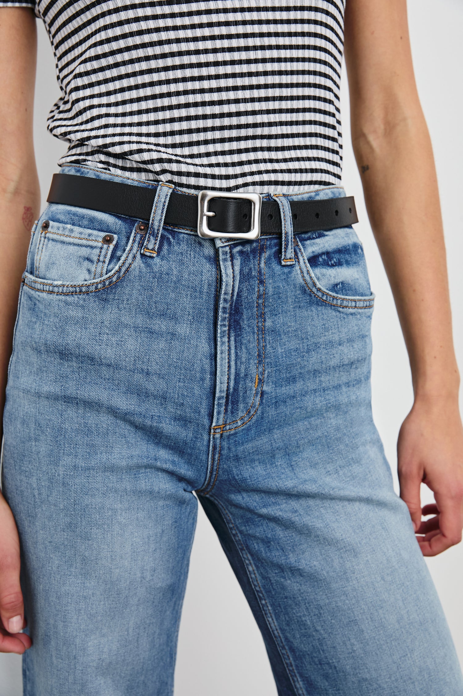 Remi Belt with a Rectangular Buckle with Rounded Corners in Brown Silver Colorway, Brown Belt and Silver-tone Buckle - Front View Featured on Model