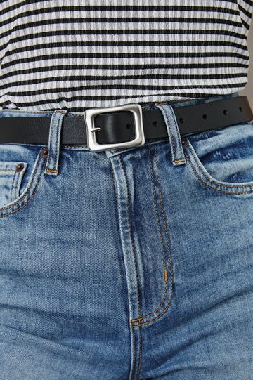Remi Belt with a Rectangular Buckle with Rounded Corners in Brown Silver Colorway, Brown Belt and Silver-tone Buckle - Front View Featured on Model