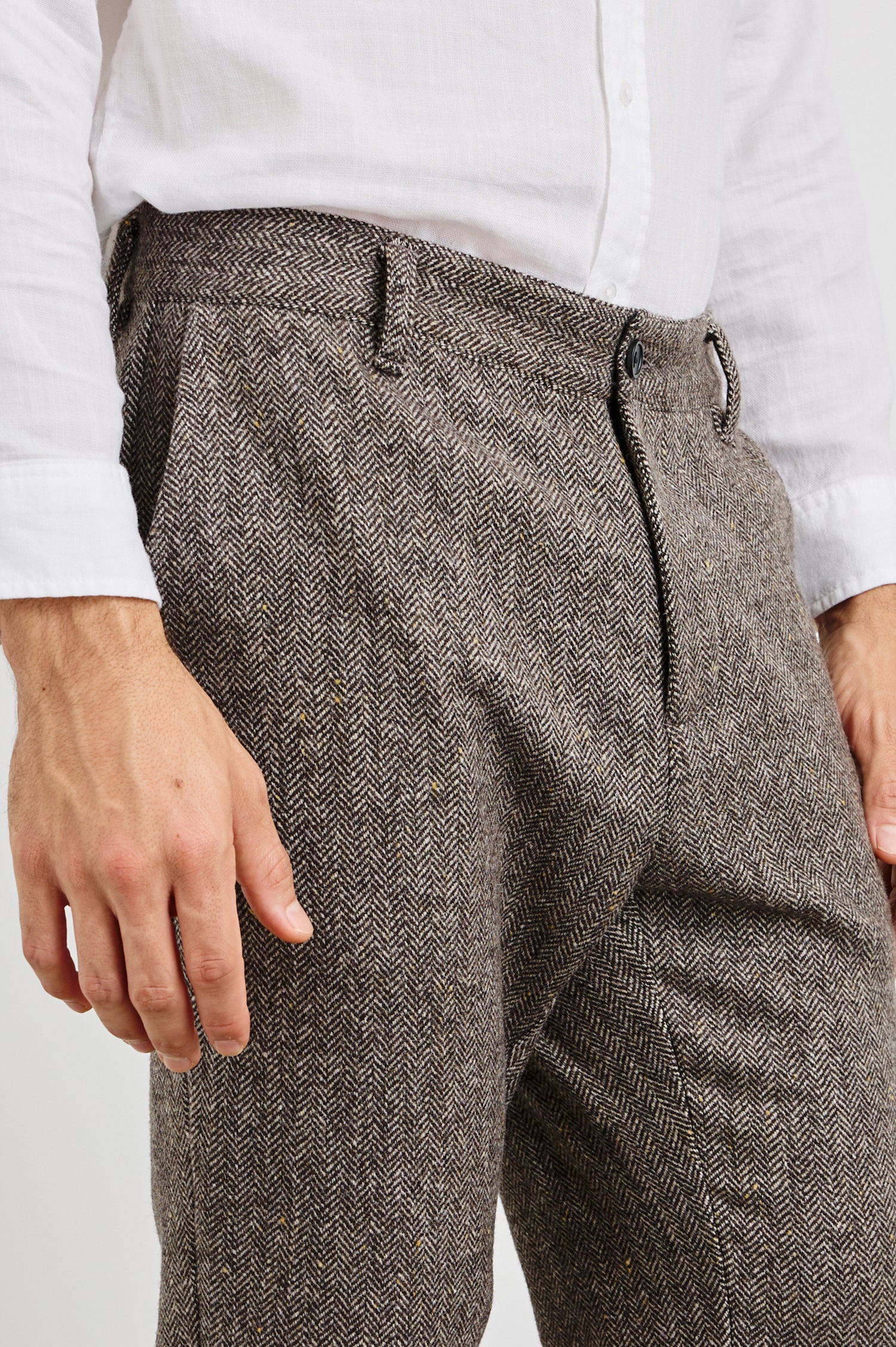 Reynard Blazer with Two Button Closure, Two Front Pockets, a Chest Welt Pocket, Herringbone Fabric in Highland Tweed Colorway, a Brown - Front View Featured on Model