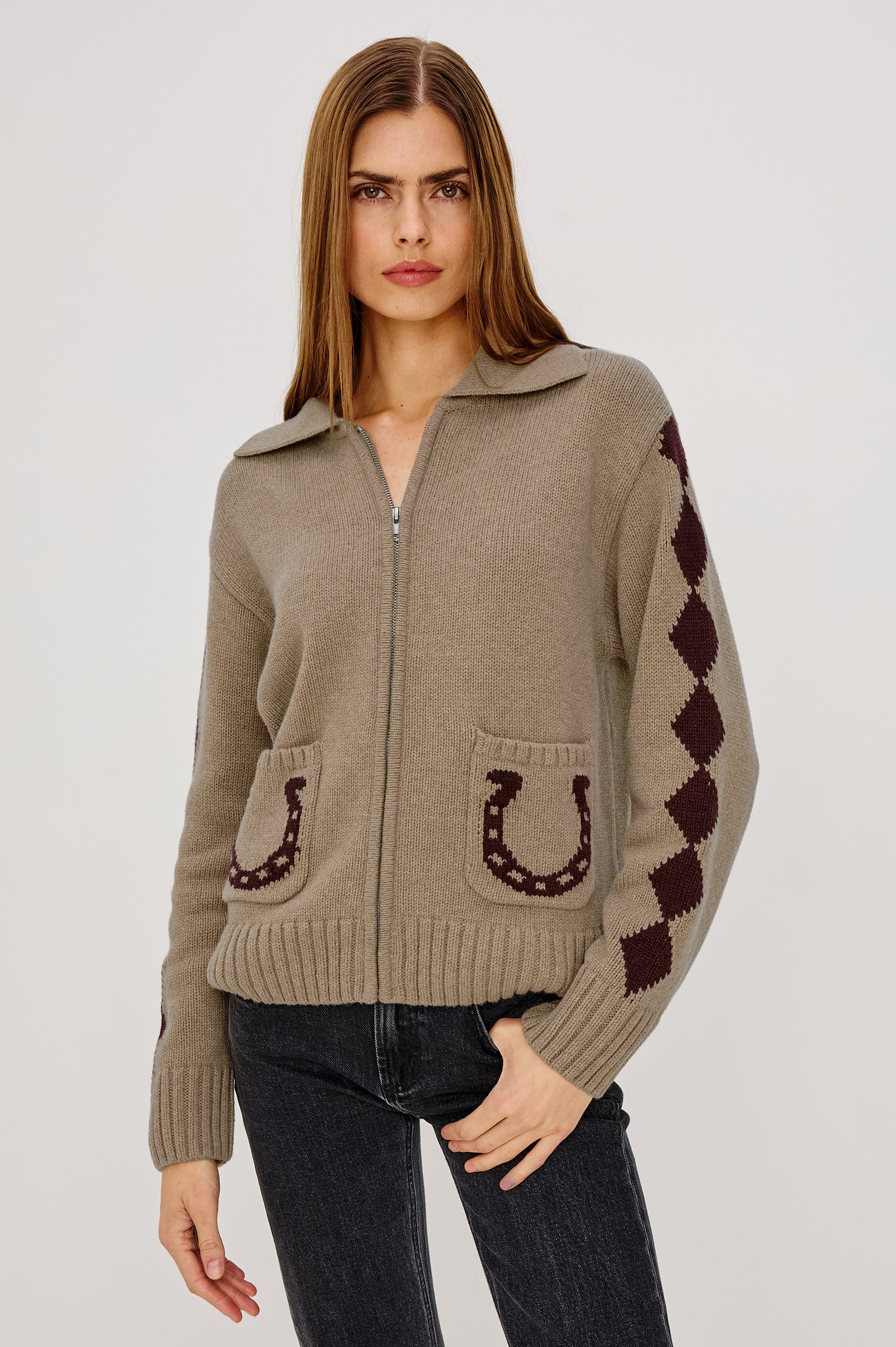 Rhea Sweater in Wool Blened With Intarsia Detailing, Spread Collar, Drop Shoulders, Long Sleeves, Relaxed Fit, Front Zip, and Patch Pockets in Horseshoes Colorway - Upper Body Front View Featured on Model