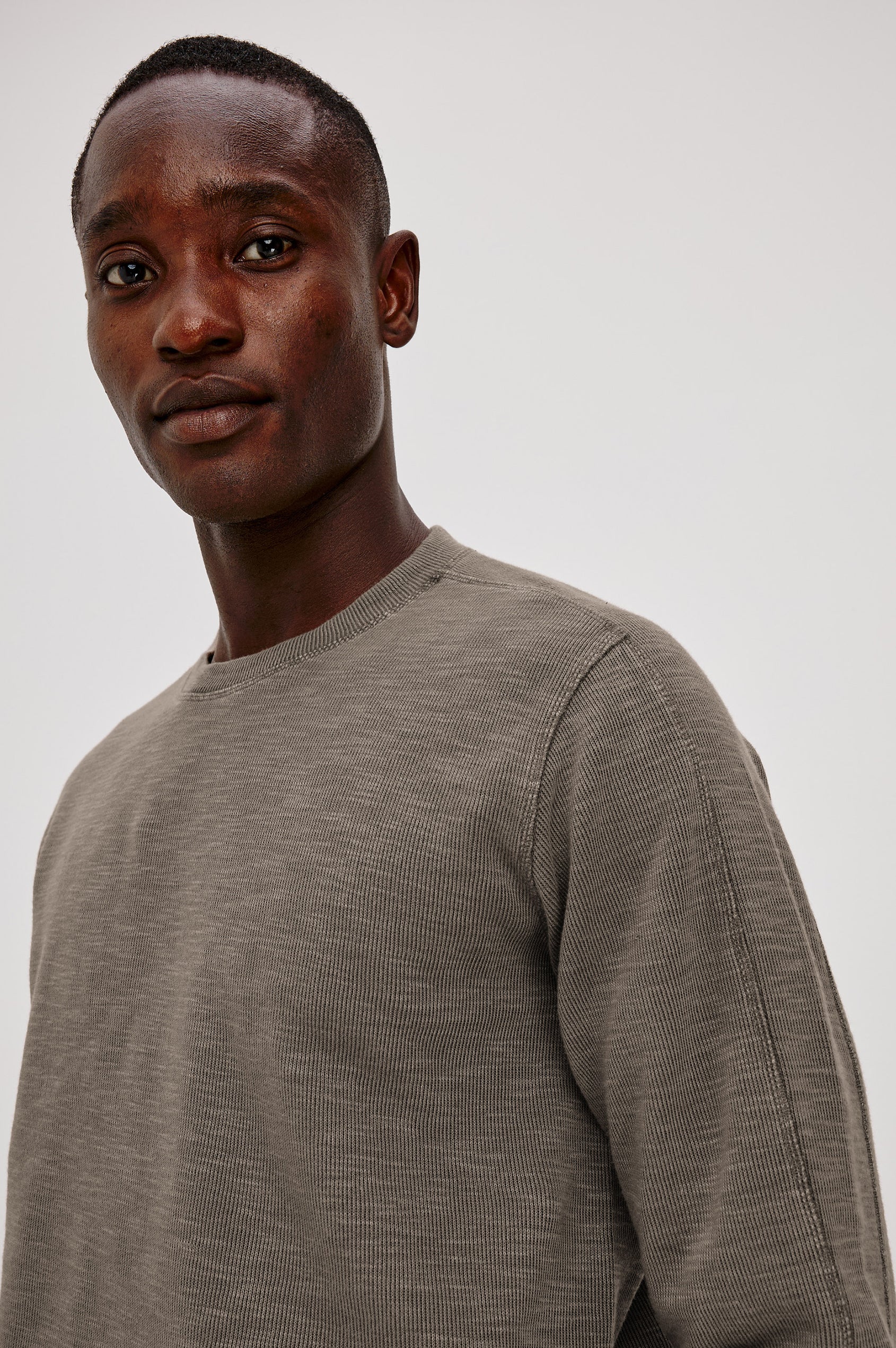 Rheese Long Sleeve Tee in French Rib With Crew Neck, Pullover Fit, and Tonal Seams in Crossroad Colorway - Upper Body Close Up View Featured on Model