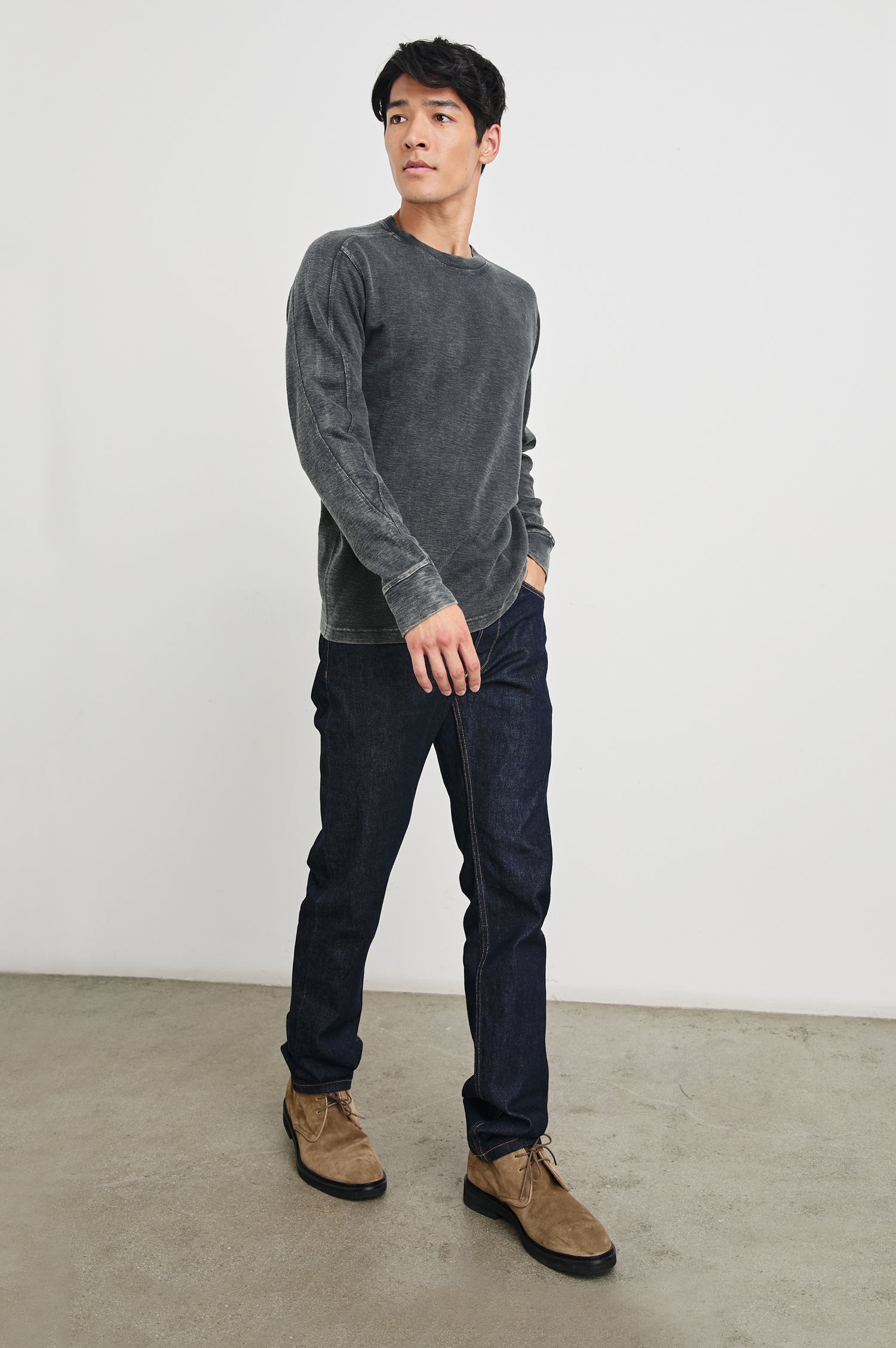 Rheese Long-Sleeve Thermal with Crew Neck and Statement Seams on Sleeves and Back in   Washed Black Colorway - Front Full Body View Featured on Model
