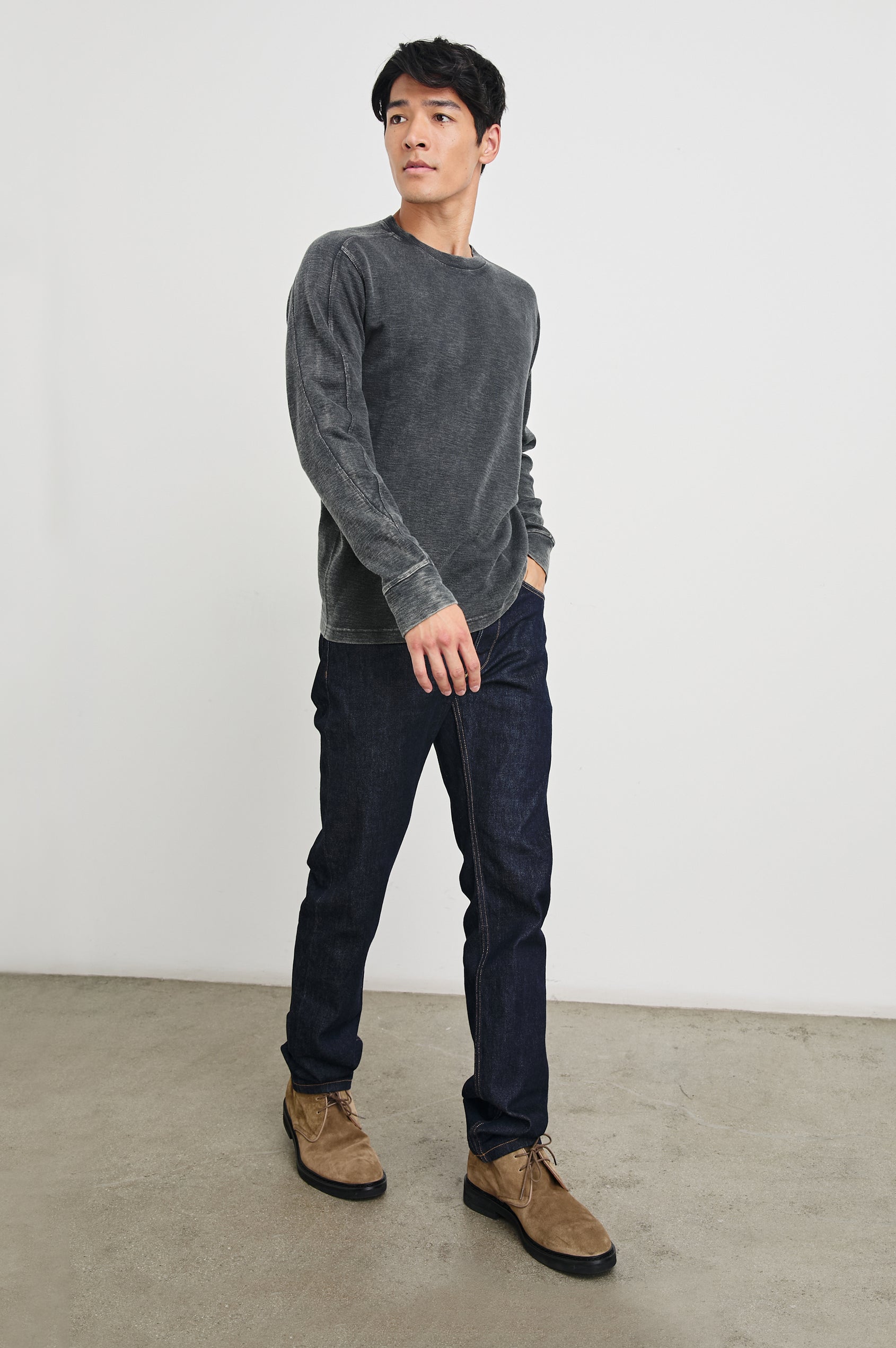 Rheese Long-Sleeve Thermal with Crew Neck and Statement Seams on Sleeves and Back in   Washed Black Colorway - Front Full Body View Featured on Model