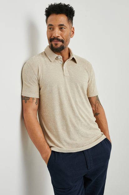 RHEN POLO SHIRT - CHICKPEA - front body leaning