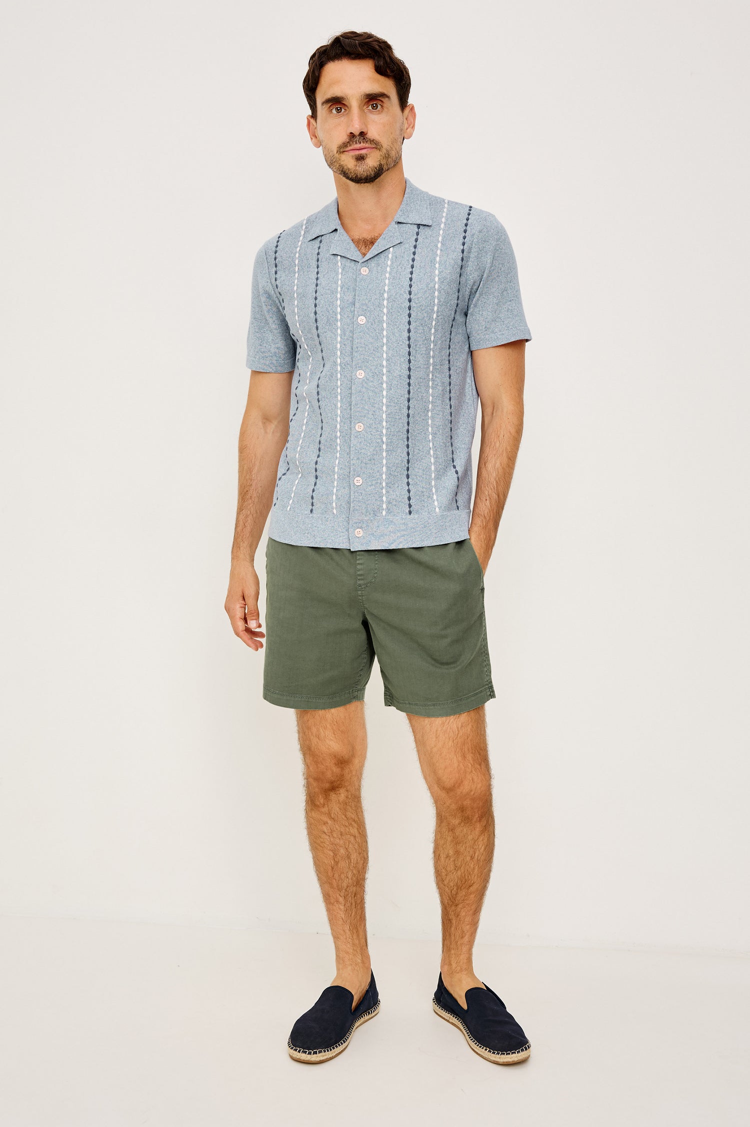 Richie Polo Shirt in Cotton Blend Knit With Collar, Front Buttons, Short Sleeves, and Classic Fit in Navy White Sky Colorway - Full Body Front View Featured on Model